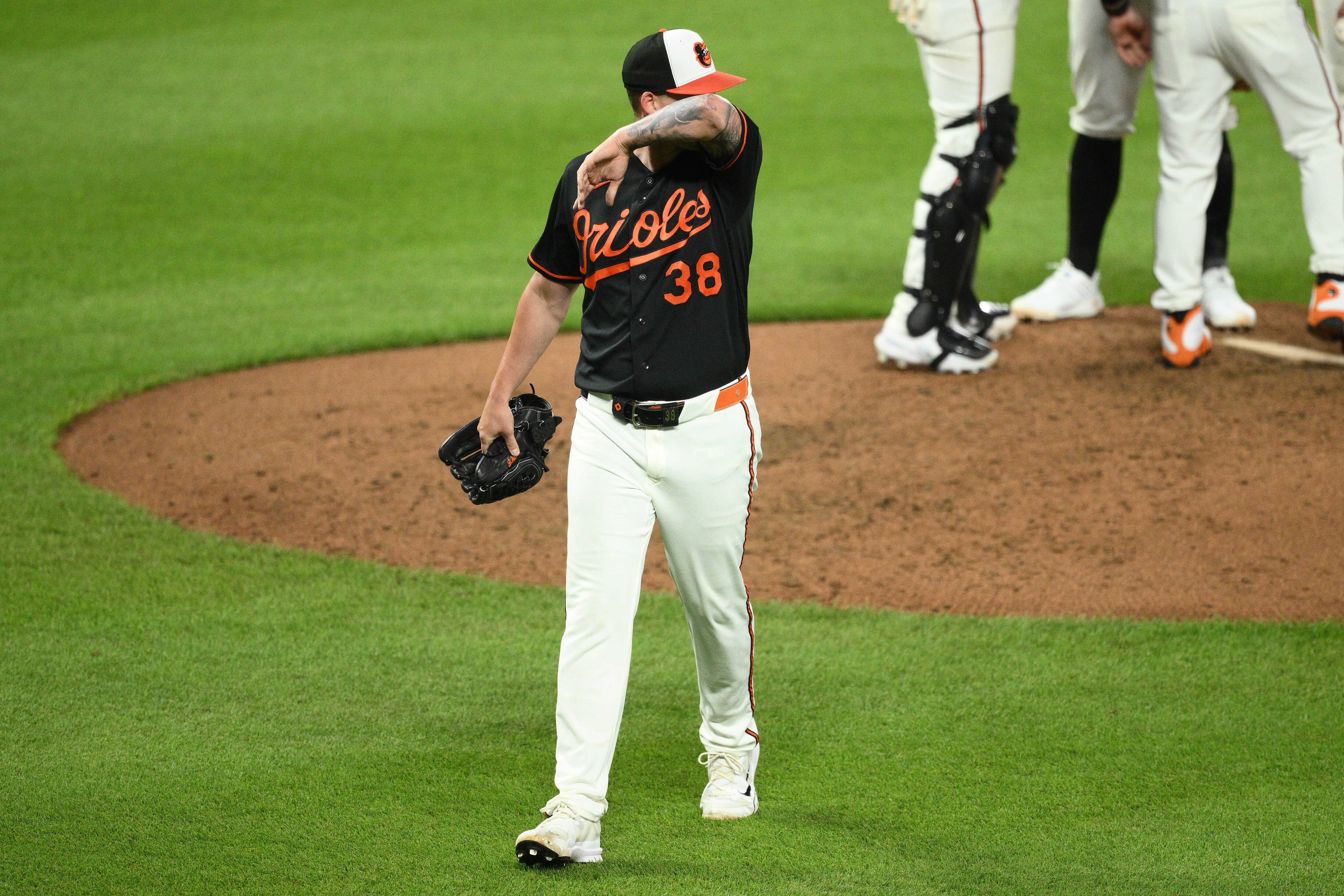 Baltimore Orioles pitcher Kyle Bradish walks back to the dugout after he was pulled during the sixth inning of a baseball game against the New York Yankees, Thursday, Aug. 20, 2026, in Baltimore. (AP Photo/Nick Wass)