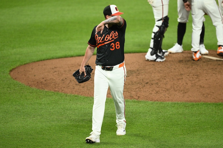 Baltimore Orioles pitcher Kyle Bradish walks back to the dugout after he was pulled during the sixth inning of a baseball game against the New York Yankees, Thursday, Aug. 20, 2026, in Baltimore. (AP Photo/Nick Wass)