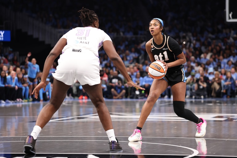 ATLANTA, GEORGIA - OCTOBER 21: Angel Reese #5 of the Atlanta Dream looks to shoot a 3-pointer against Aminata Gueye #31 of the Golden State Valkyries during the second quarter in game three of the WNBA Finals at State Farm Arena on October 21, 2026 in Atlanta, Georgia. NOTE TO USER: User expressly acknowledges and agrees that, by downloading and or using this photograph, User is consenting to the terms and conditions of the Getty Images License Agreement. (Photo by Kevin C. Cox/Getty Images)