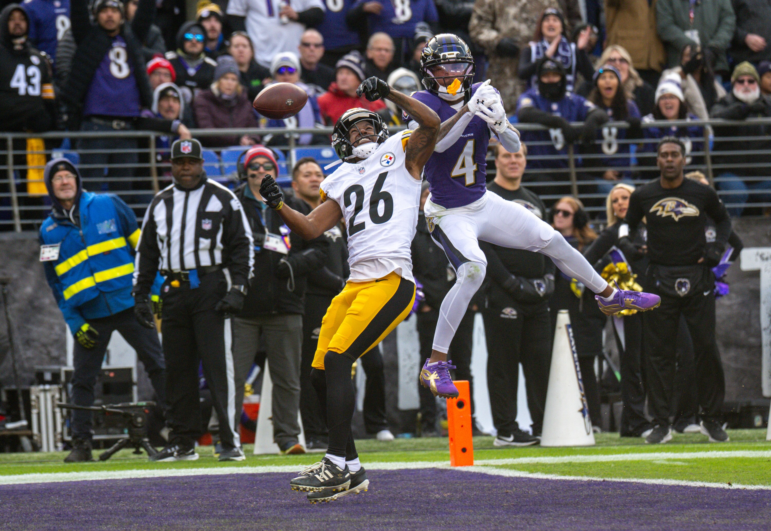 A pass eludes Ravens wide receiver Zay Flowers in the end zone as he is defended by Steelers cornerback Brandin Echols.