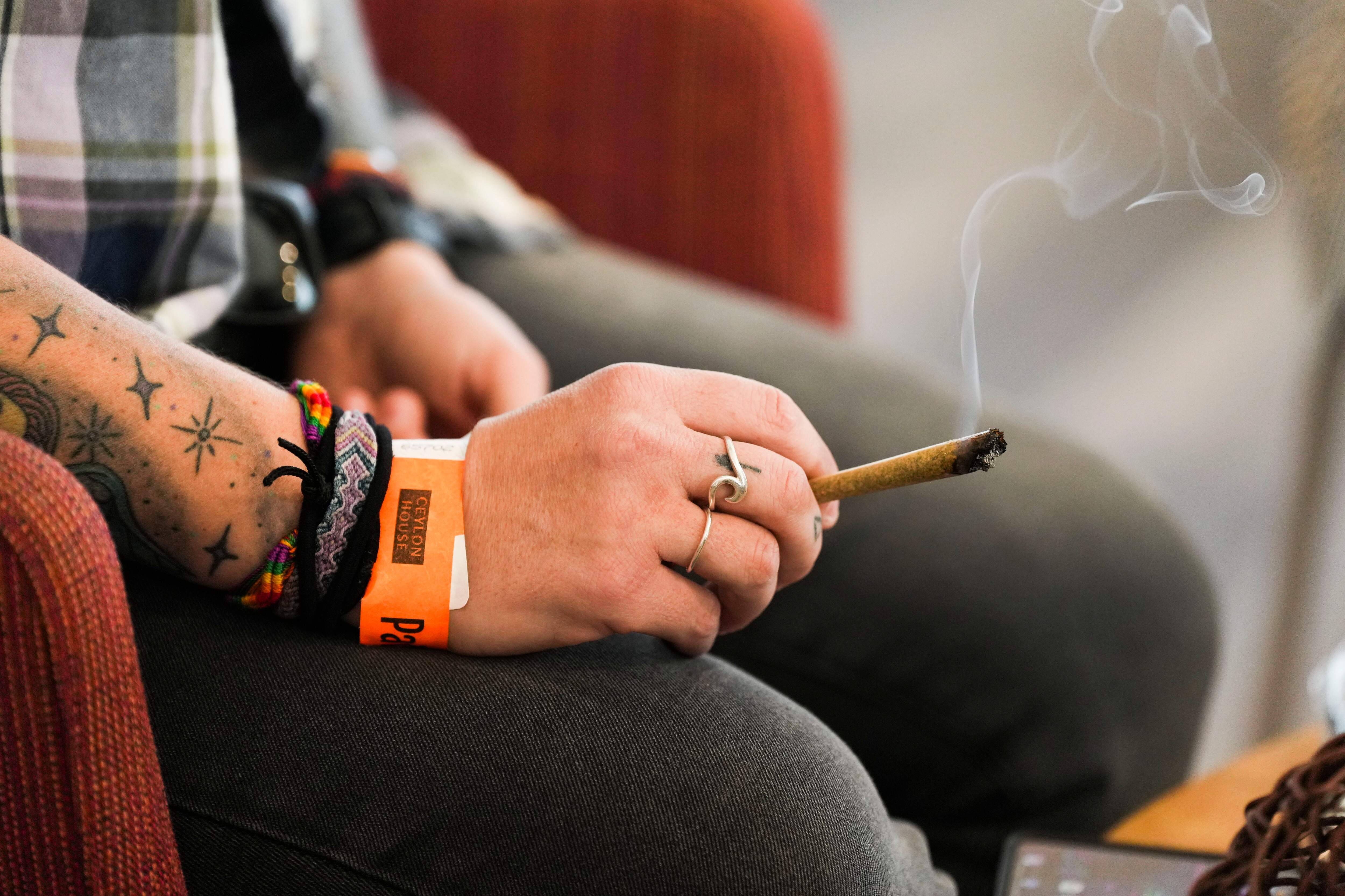 Kristin Cousins, 38, enjoys time with friends at the grand opening of Ceylon House, Maryland's first cannabis lounge, on March 5, 2023.