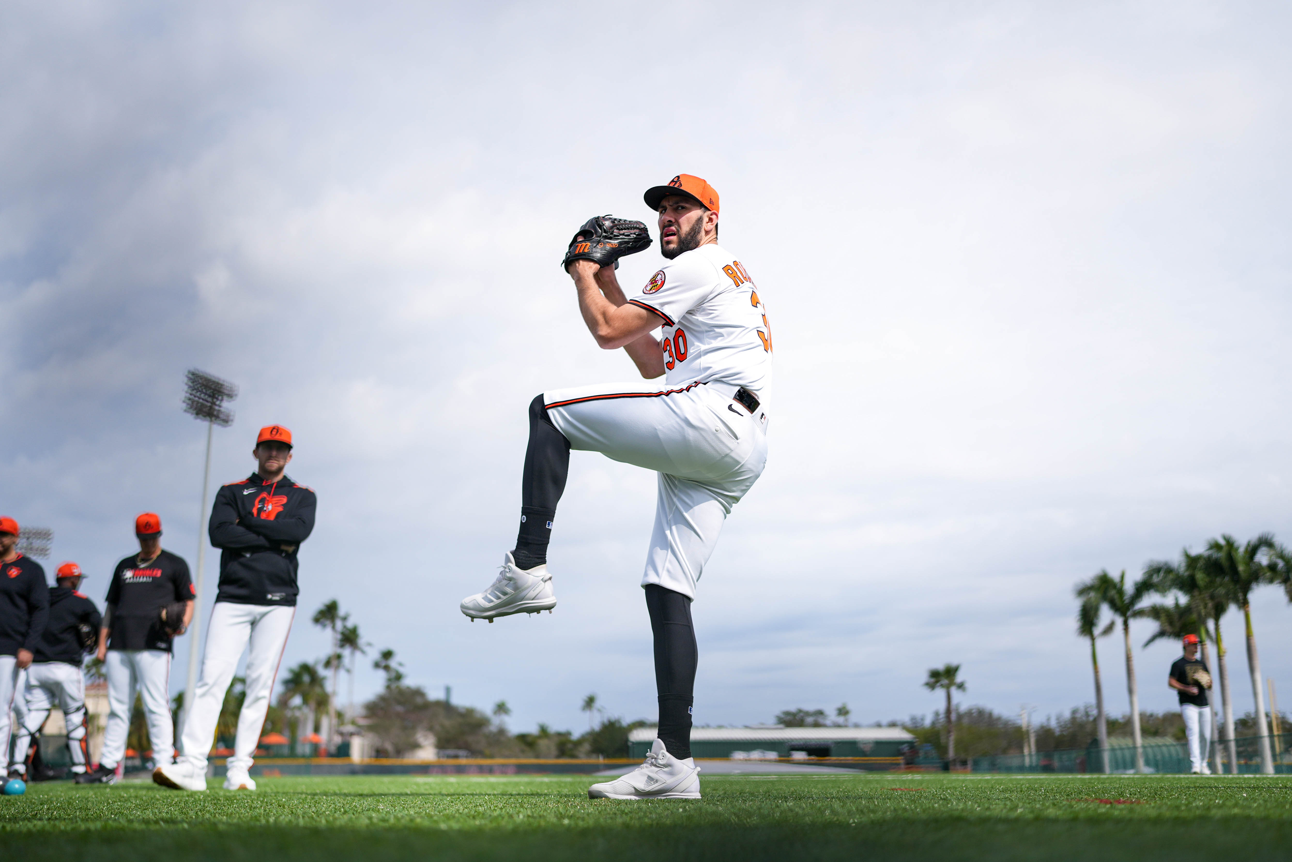 Baltimore Orioles pitcher Grayson Rodriguez (30) warms up ahead of a bullpen session during Spring Training at Ed Smith Stadium in Sarasota, Fla. on Saturday, February 22, 2025.