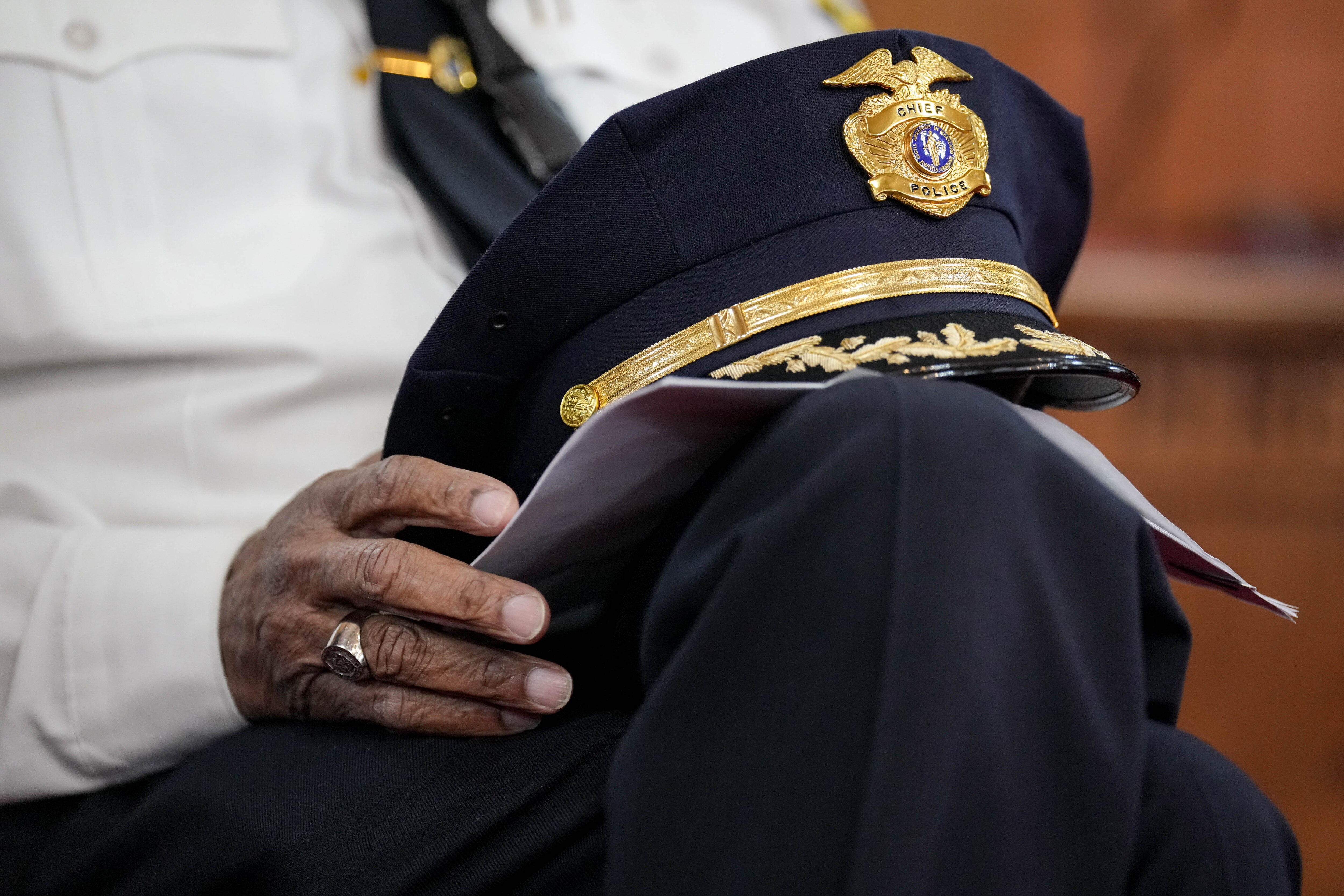 Annapolis Chief of Police Edward Jackson removes his cap during a listening session at First Baptist Church in Annapolis, Md. on Tuesday, March 25, 2025.
