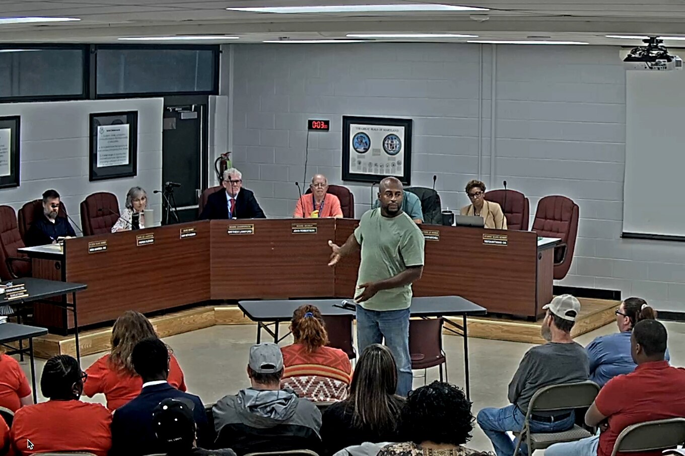 A still from the livestream of the last in-person board meeting on August 19 as parent Joe Hylton speaks before the Somerset County school board.