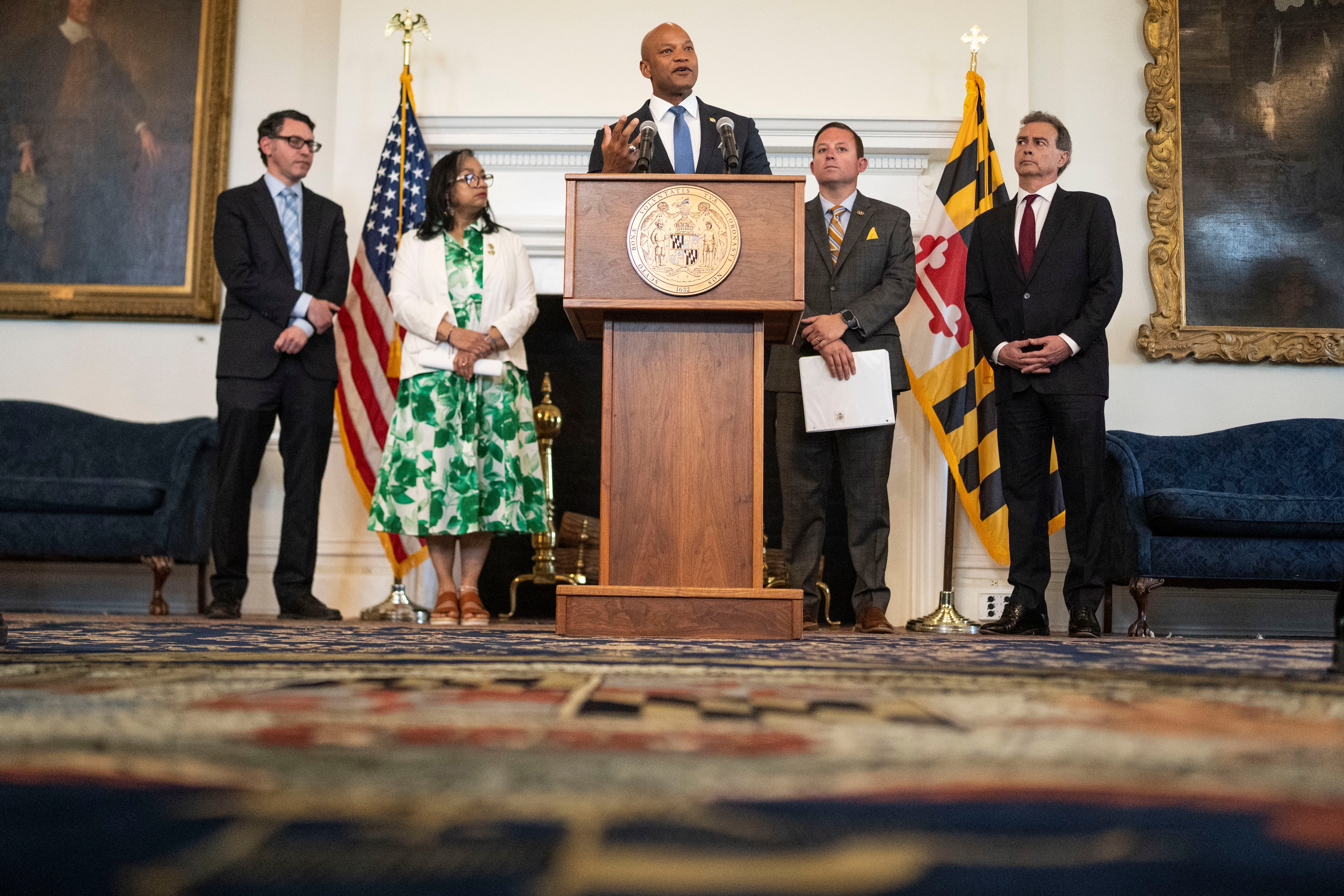 From left, Del. Marc Korman, House Speaker Joseline Peña-Melnyk, Gov. Wes Moore, Senate President Bill Ferguson and Sen. Brian Feldman hold a press conference to announce an agreement to advance the Utility RELIEF Act through final passage on Monday.