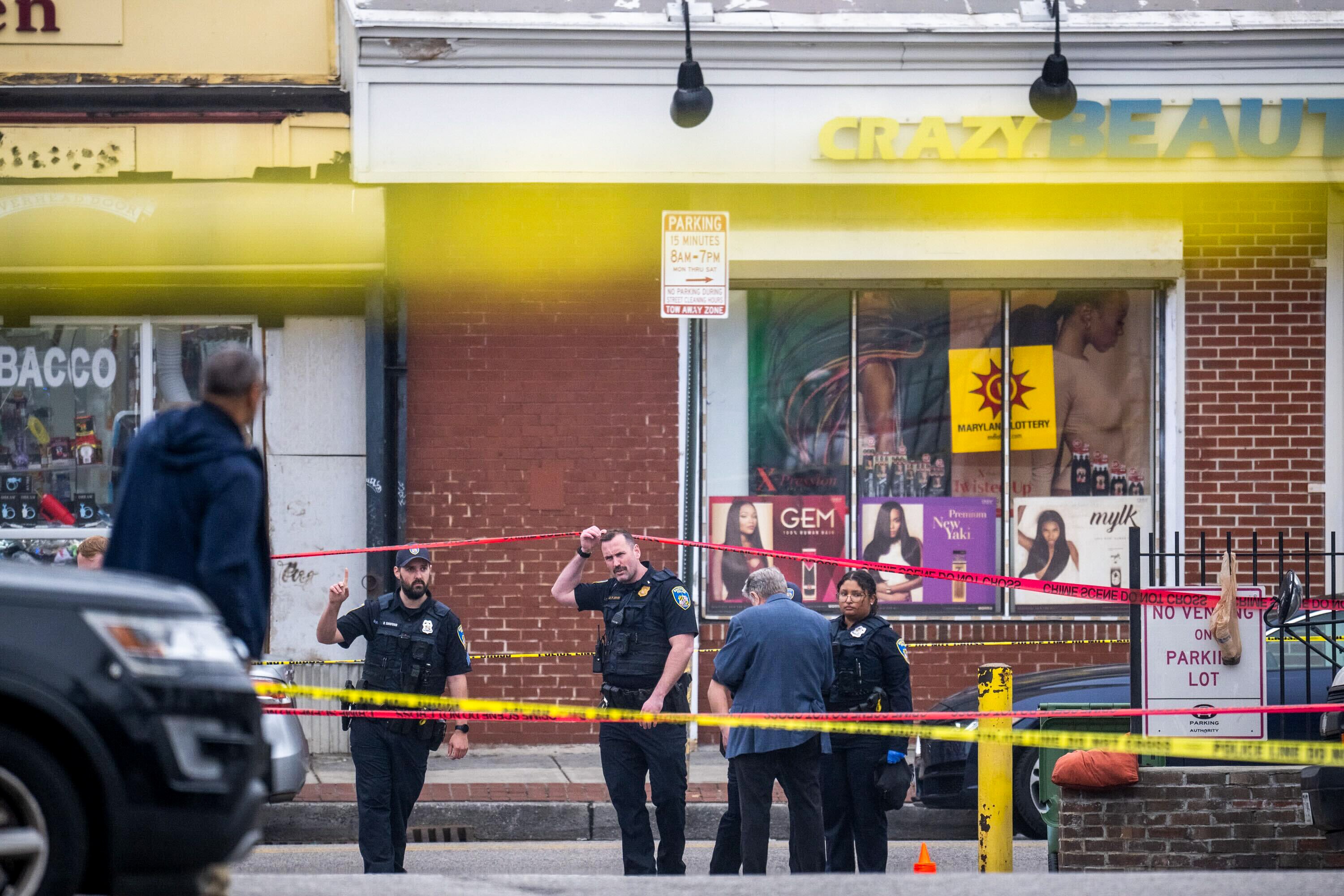 Baltimore PD officers respond to the scene of a police-involved shooting on the 1700 block of Pennsylvania Avenue on Thursday.