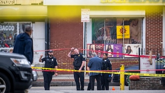 Baltimore PD officers respond to the scene of a police-involved shooting on the 1700 block of Pennsylvania Avenue on Thursday.
