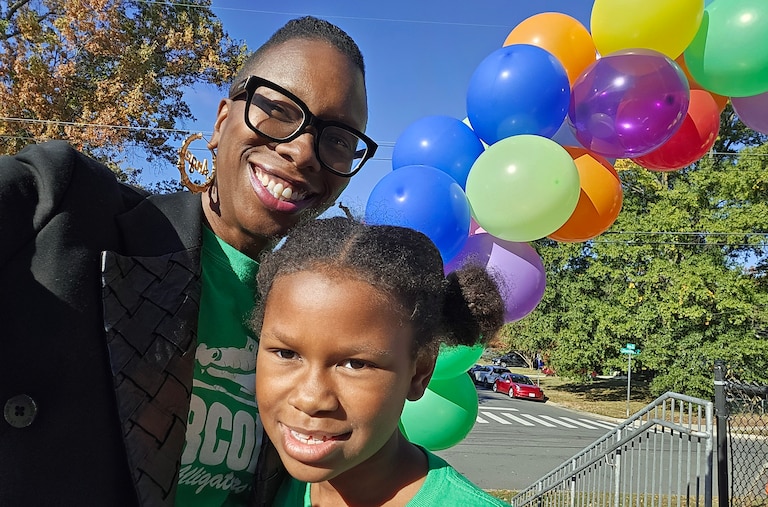 Angel Johnson and her daughter love the longer school year at Arcola, crediting it for the fourth-graders academic success. Photo taken at Arcola Elementary in Silver Spring.