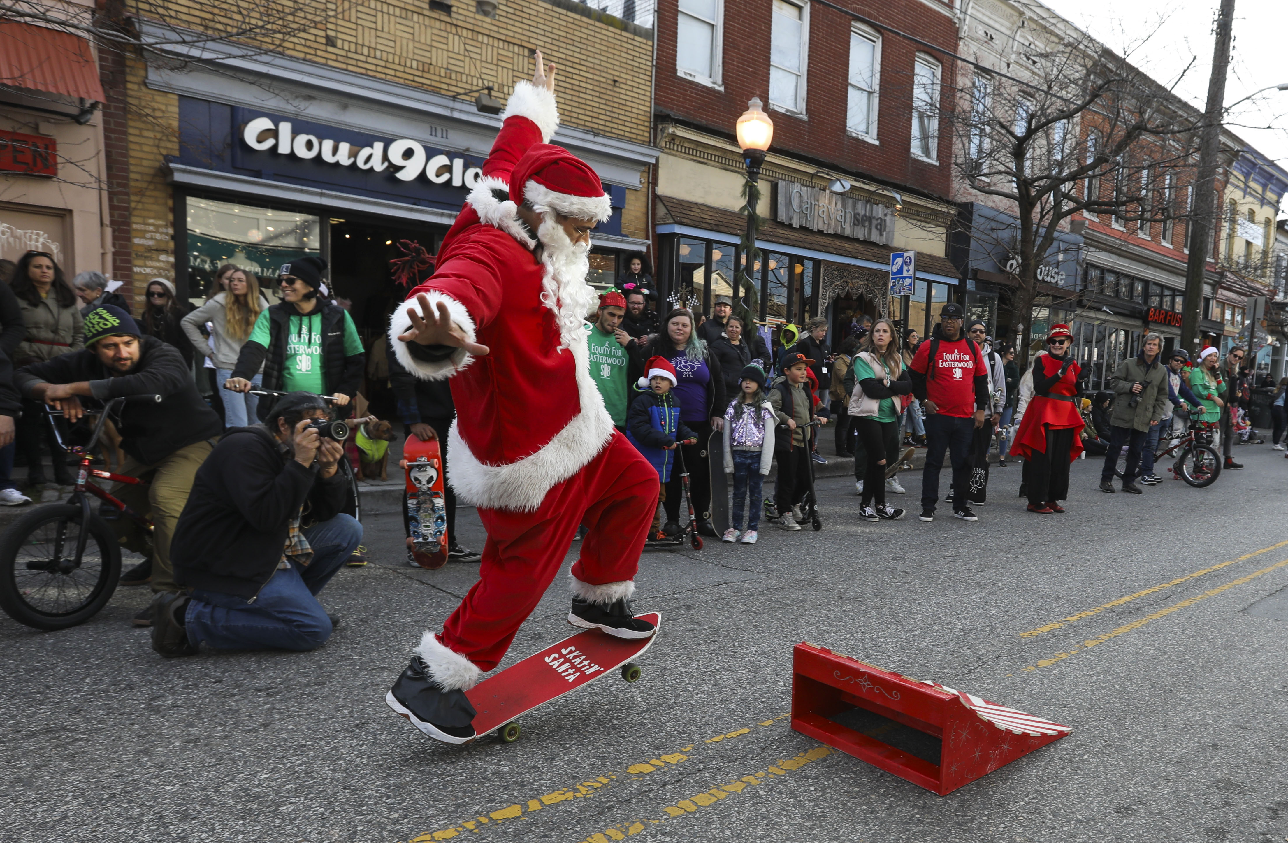 Jimmy Pelletier, from DC Wheels Charity, wows the crowds with skateboard moves at Hampden's Annual Holiday Parade on December 4, 2022.