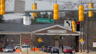 Cars travel through the main gate at Fort Meade on February 14, 2018 in Fort Meade, Maryland.