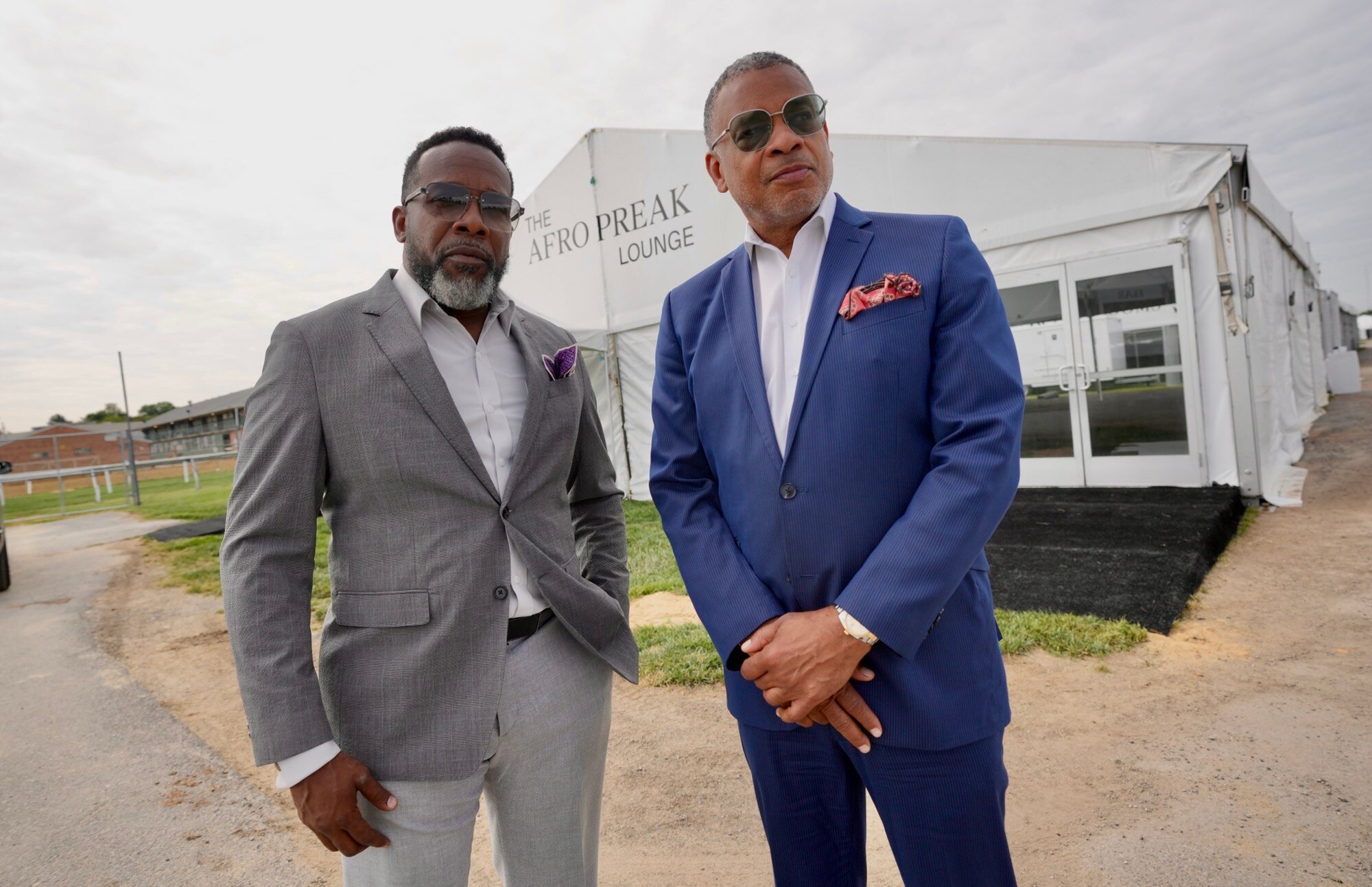 Derrick Chase, left, and LaRian Finney, right, organizers of AfroPreak Lounge at Pimlico on May 16, 2023.