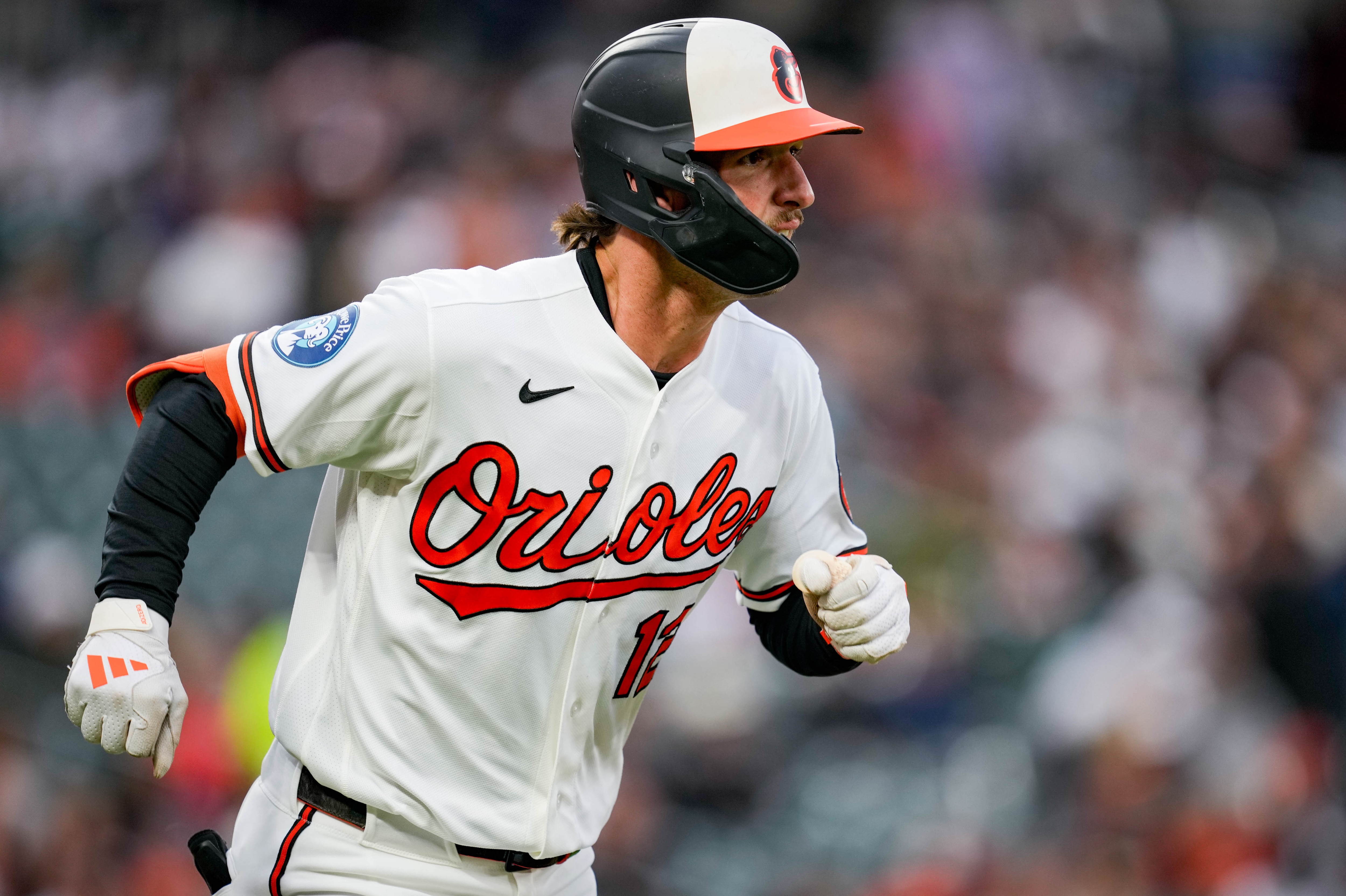 Orioles outfielder Dylan Beavers runs after connecting with a pitch in the second inning against the Houston Astros on April 28.