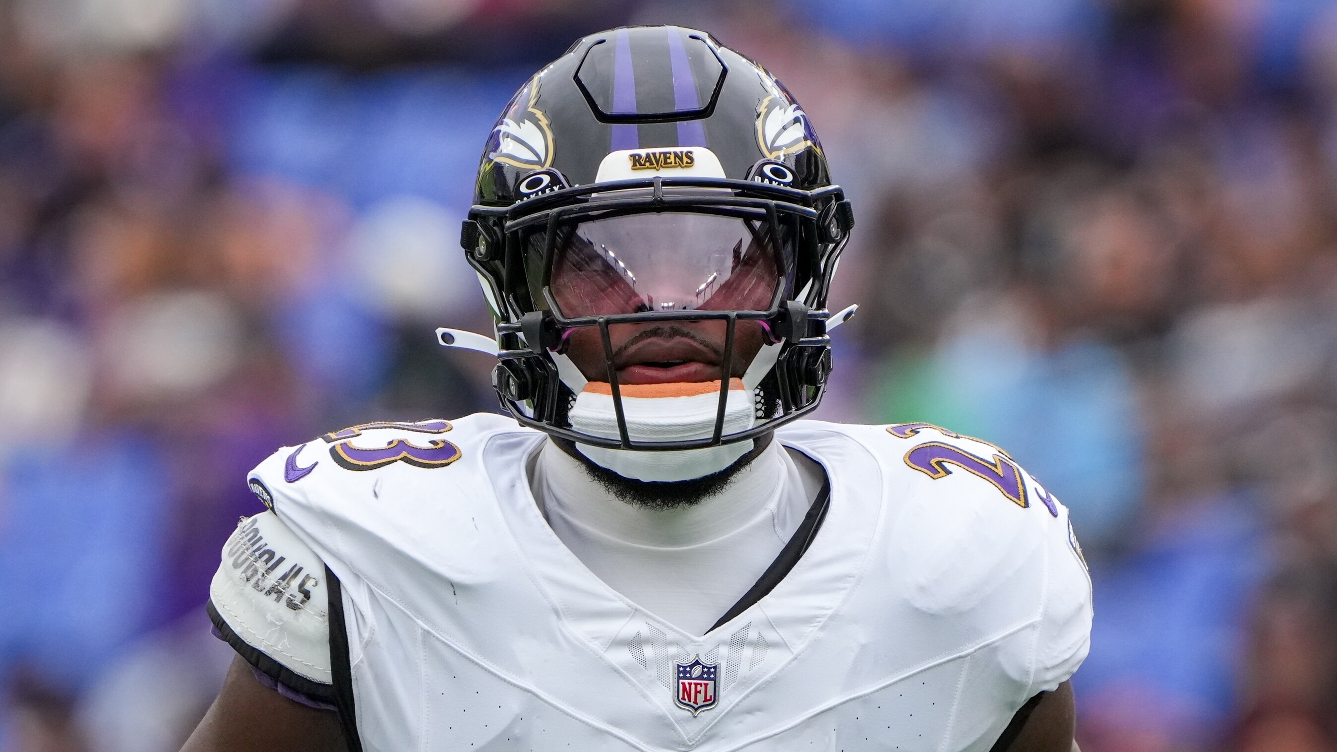 Baltimore Ravens linebacker Trenton Simpson (23) locks eyes with the opposing quarterback in a preseason game against the Atlanta Falcons at M&T Bank Stadium in Baltimore on August 17, 2024.