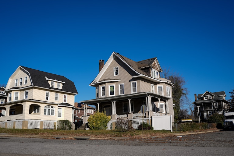 The exterior of Bonita Anderson’s home, center, on Roslyn Ave. in Baltimore, Md. on Thursday, December 12, 2024. Anderson is one of many Baltimore residents at risk of losing their homes due to tax sale because of city errors.
