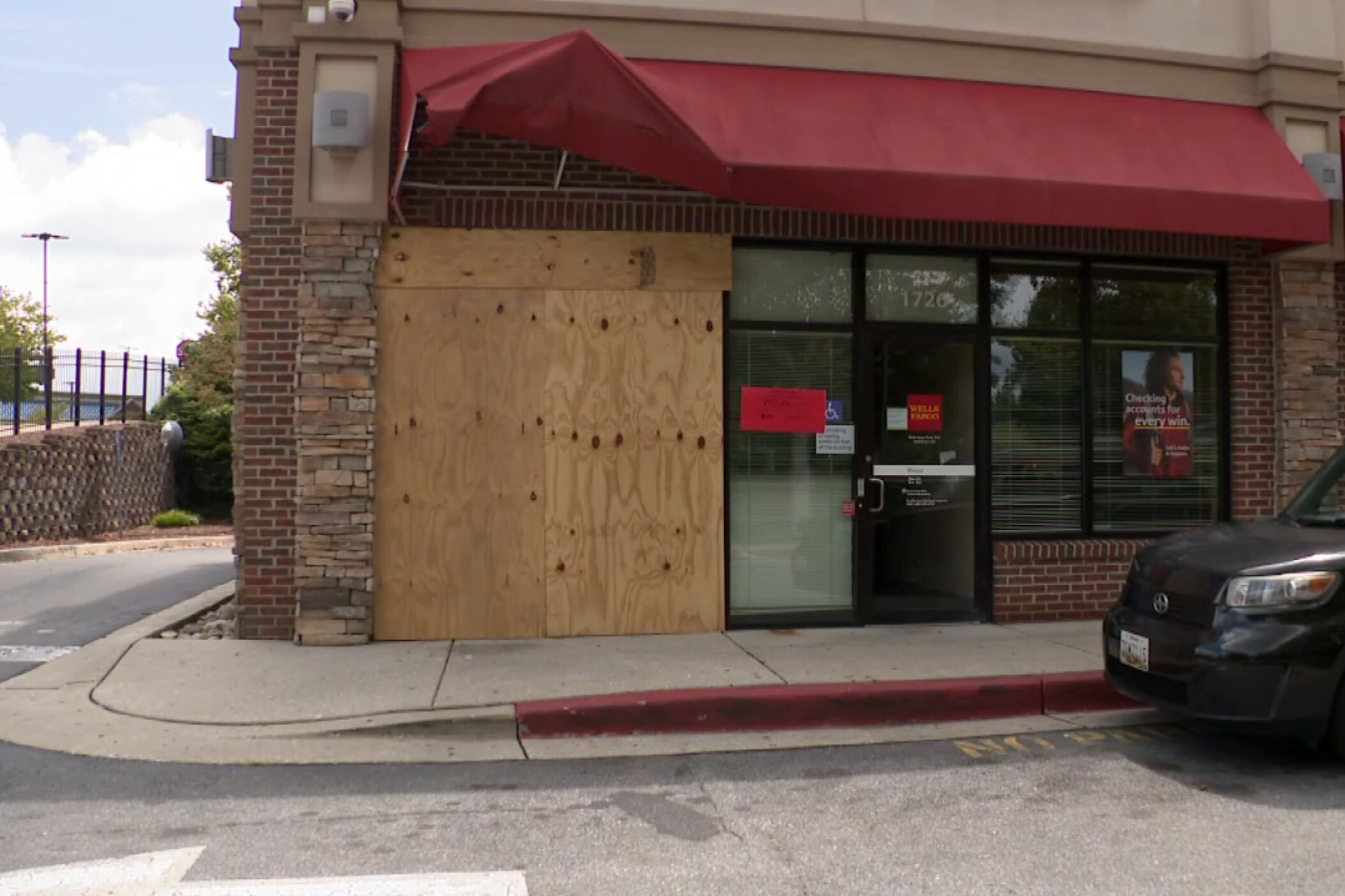 Criminals used construction equipment to smash through a Wells Fargo Bank near a busy intersection in Northeast Baltimore Sunday morning.