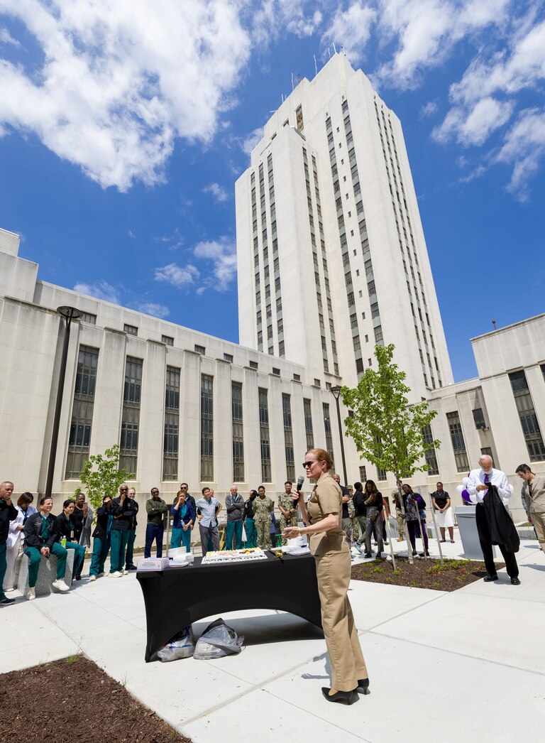 Navy Capt. Melissa Austin, director of the Walter Reed National Military Medical Center, talks during the opening ceremonies in May 2025 for the new Roosevelt Pavilion in Bethesda.