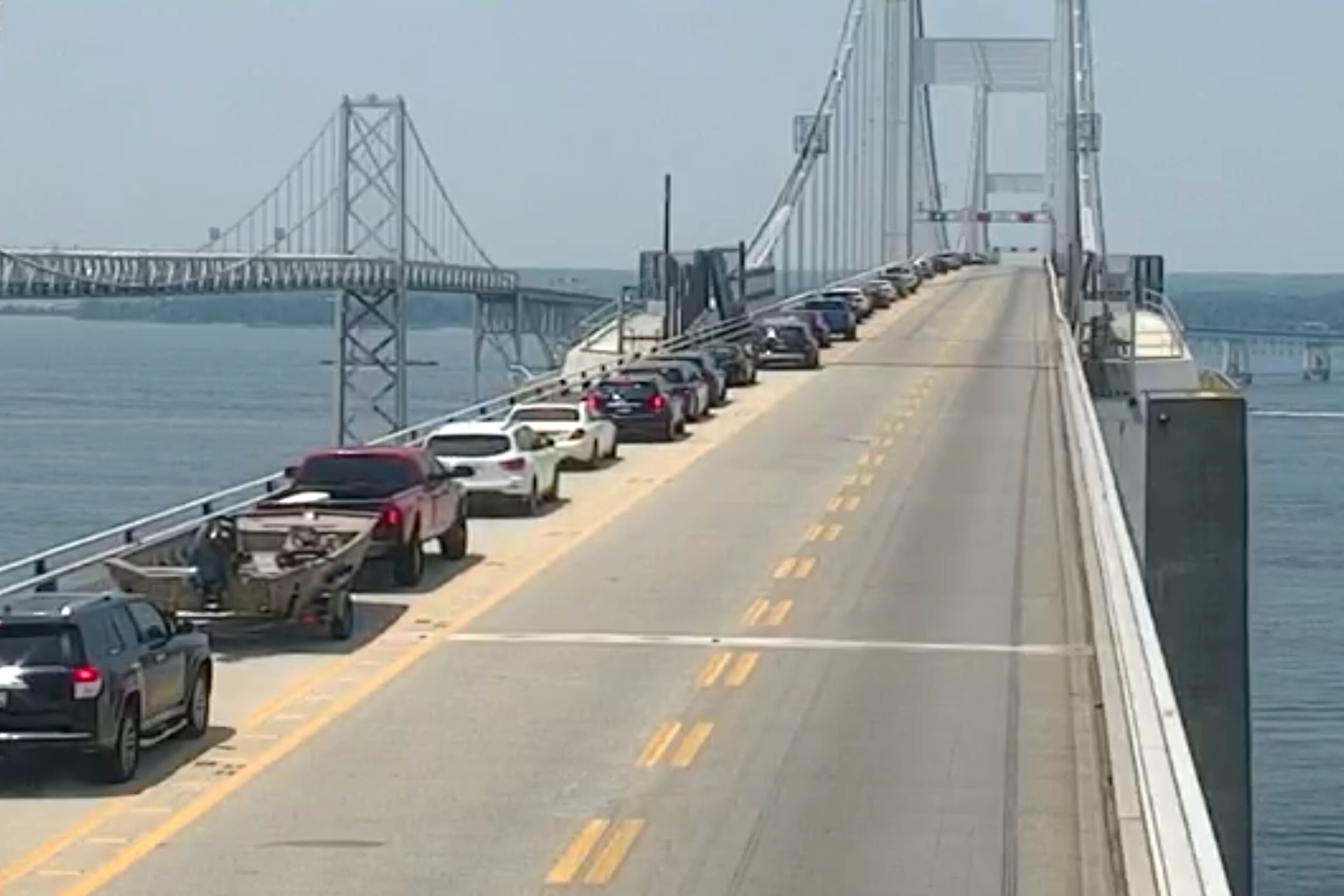 An MDOT traffic camera shows that as of 1 p.m. on Friday, July 4, 20205, the left lane has reopened after all lanes were blocked going westbound on the Chesapeake Bay Bridge/US 50 due to a multi-vehicle crash.