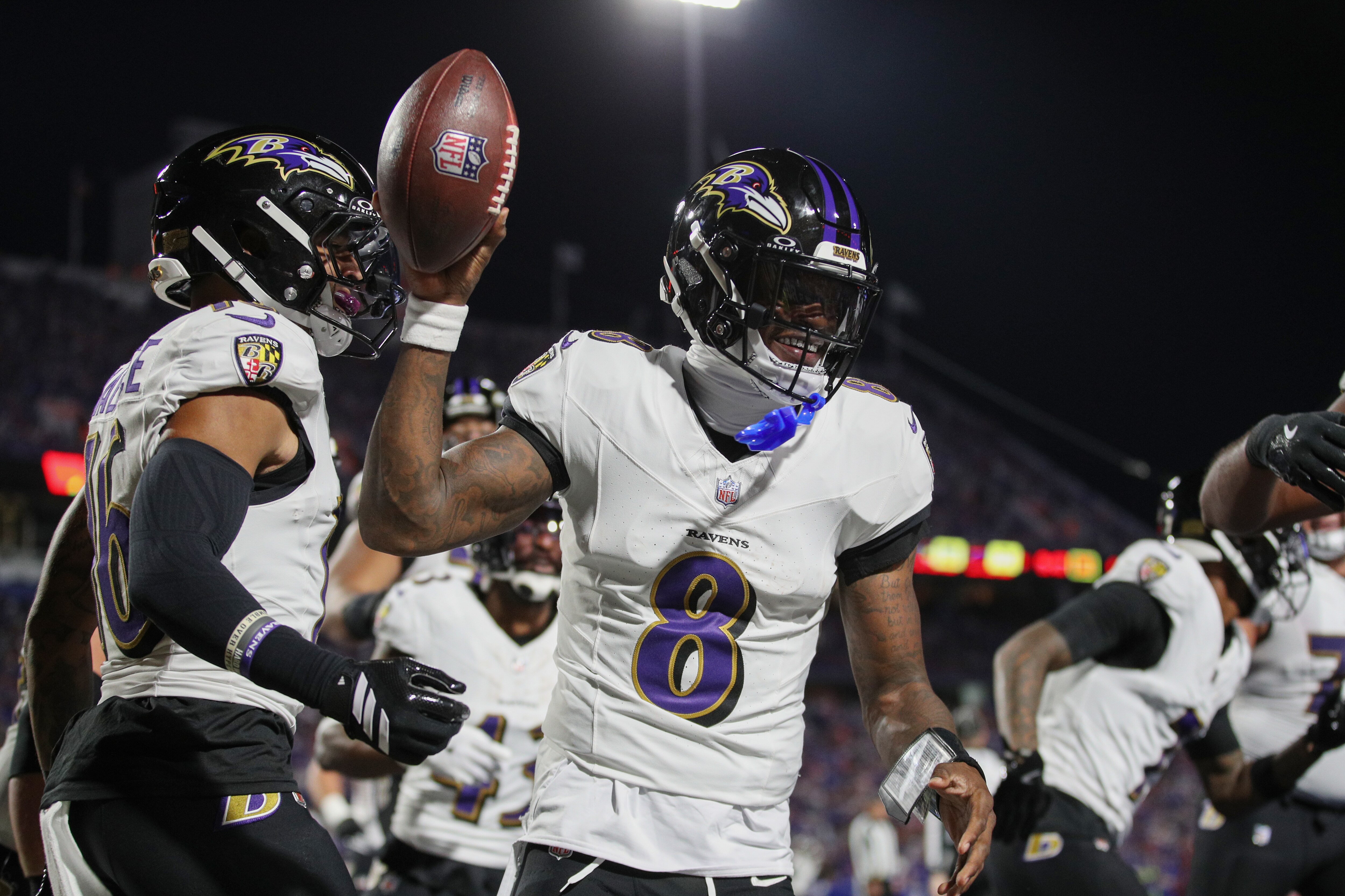 Lamar Jackson celebrates after scoring a touchdown during the second quarter against the Buffalo Bills.