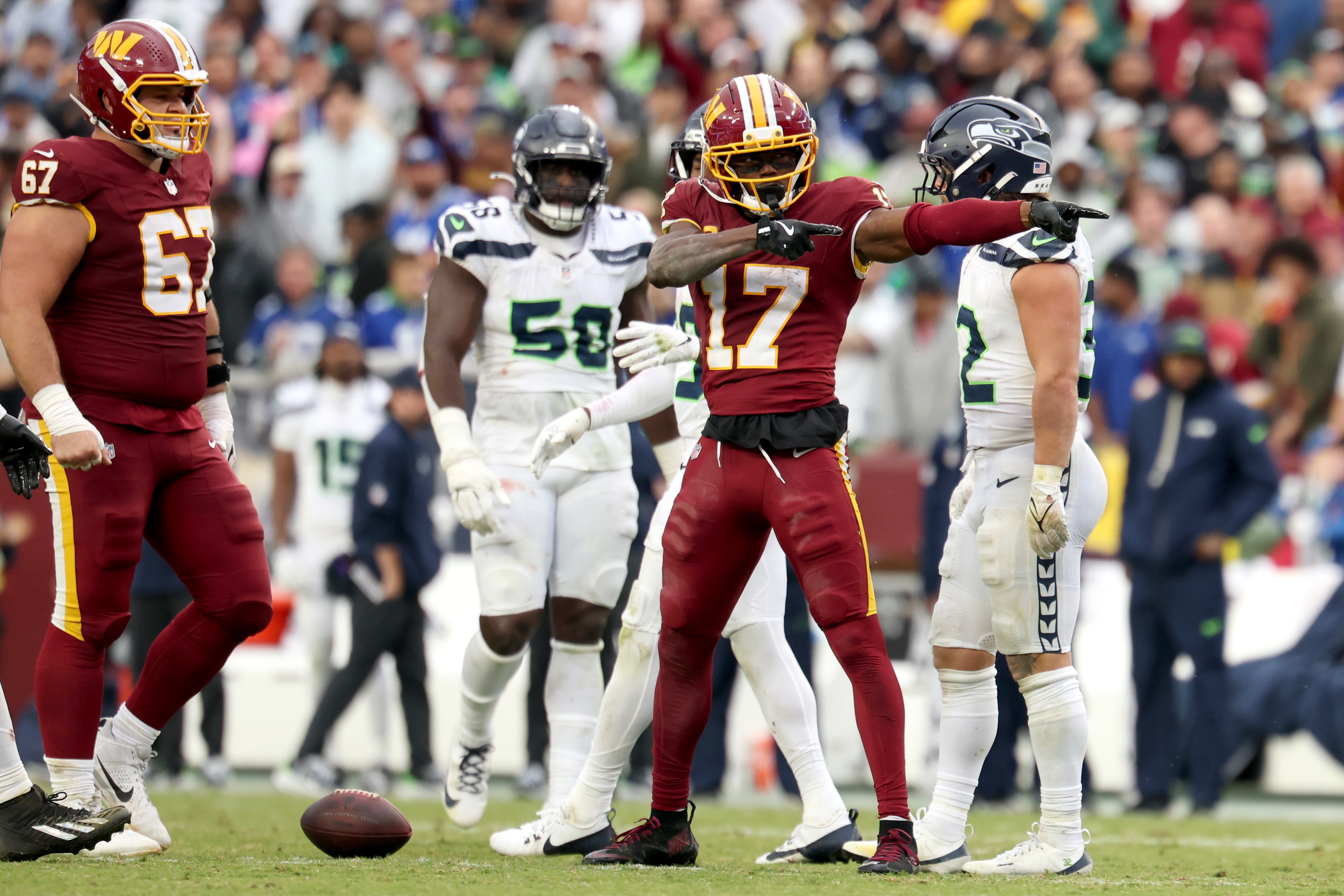 Terry McLaurin signals for a first down Sunday during the fourth quarter of the Commanders’ 33-31 win over the Seahawks.