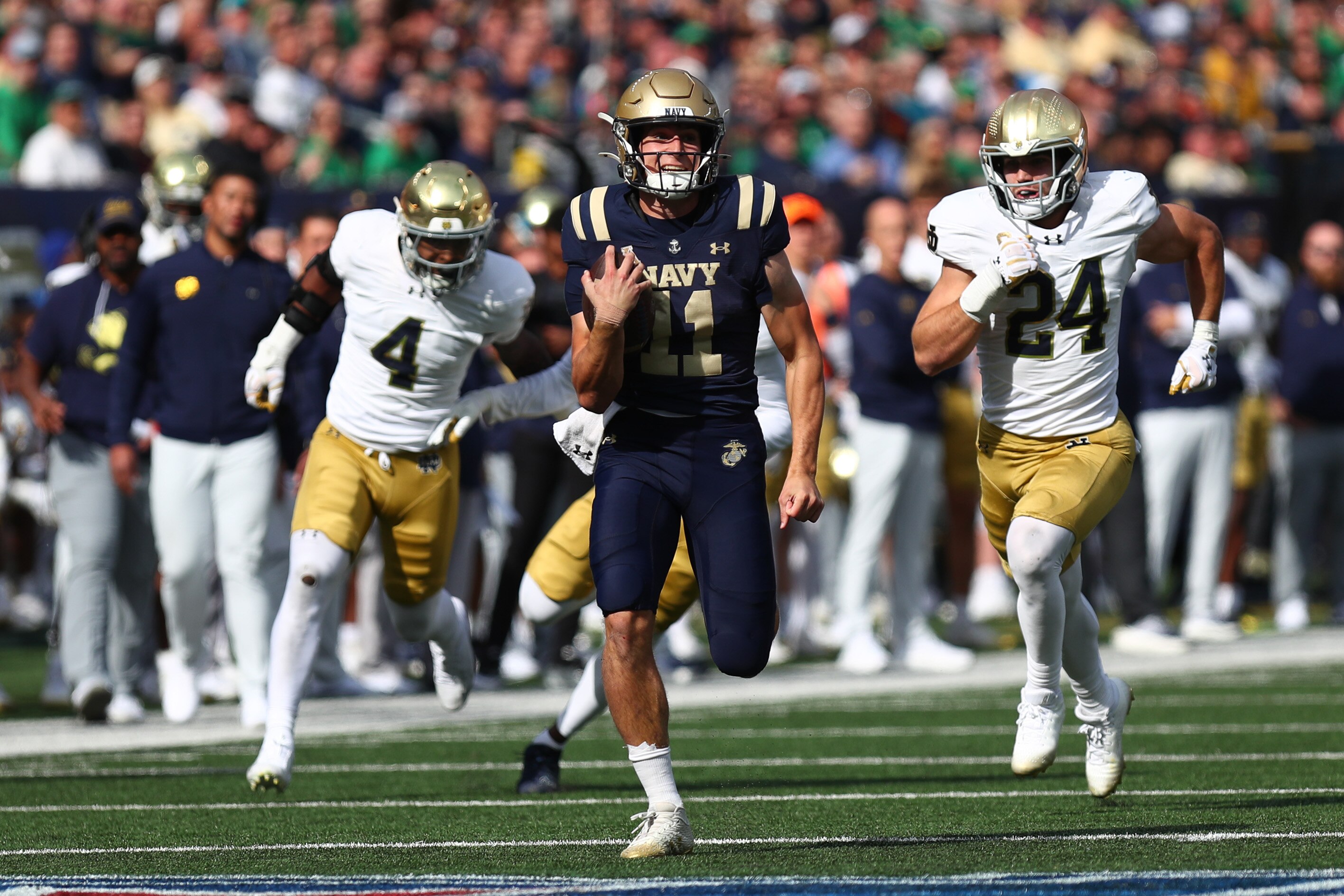 Navy quarterback Blake Horvath runs for a touchdown against the Notre Dame Fighting Irish during the first half at MetLife Stadium on Oct. 26. Navy plays Tulane this weekend in their final home game of the season.