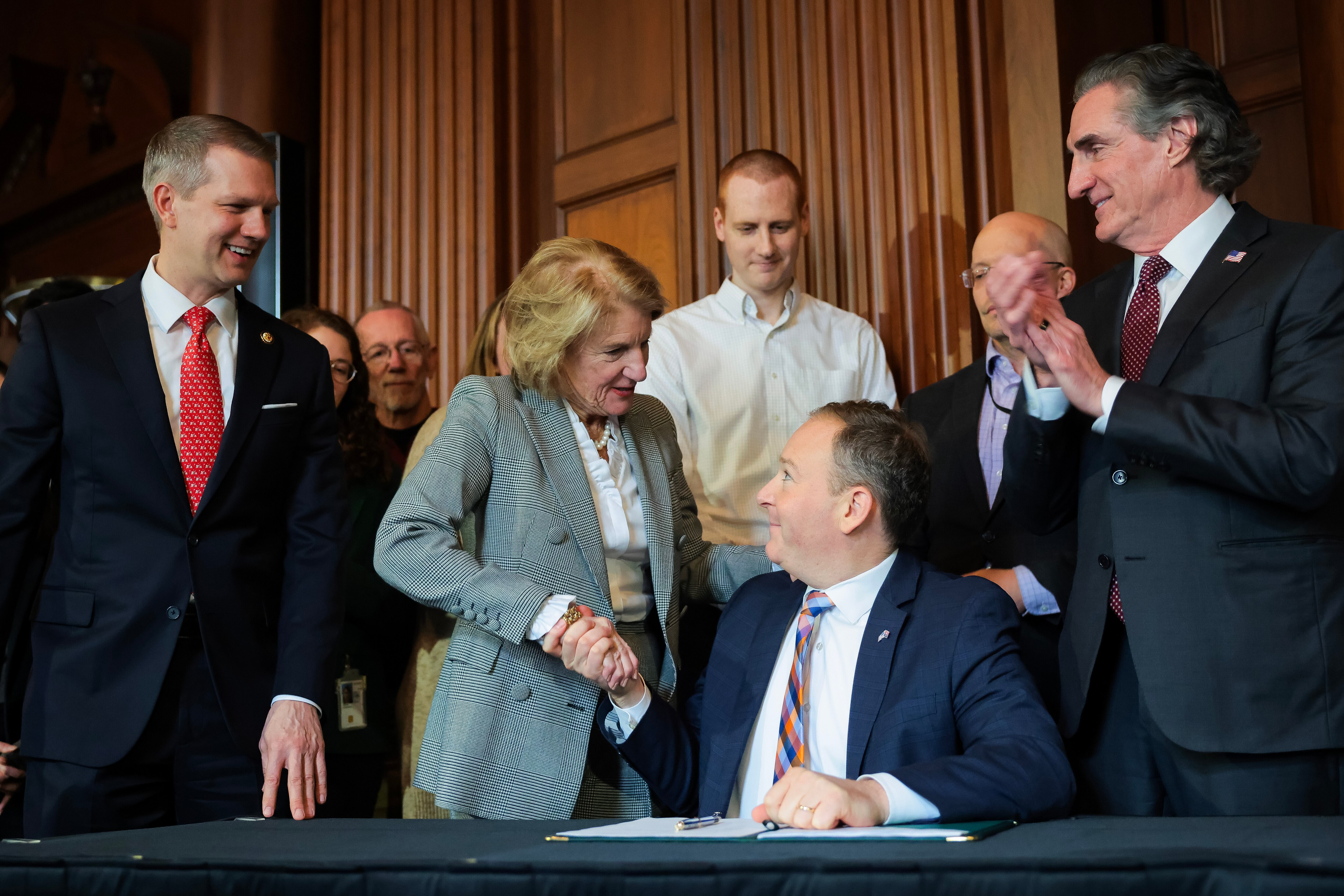 WASHINGTON, DC - FEBRUARY 18: From left, U.S. Rep. Riley Moore (R., W.V.), Sen. Shelley Moore Capito (R., W.V.), EPA Administrator Lee Zeldin, and Secretary of the Interior Doug Burgum celebrate after signing a Water Policy Announcement at the Environmental Protection Agency Headquarters on February 18, 2025 in Washington, D.C. EPA Administrator Lee Zeldin made a water policy announcement and held a signing ceremony with members of the West Virginia Congressional Delegation.