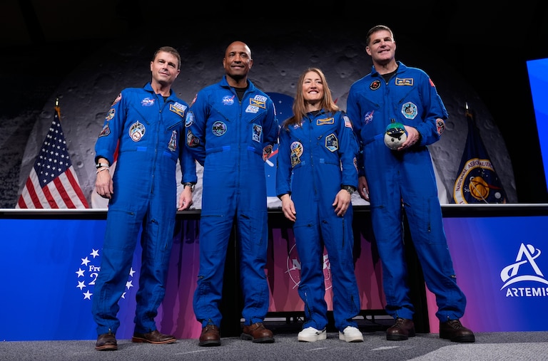 NASA's Artemis II crew - NASA astronauts Reid Wiseman, Victor Glover, and Christina Koch, and Canadian Space Agency (CSA) astronaut Jeremy Hansen pose for a photo during a press conference on Thursday, April 16, 2026, in Houston. (AP Photo/Ashley Landis)