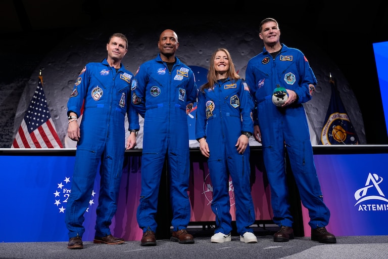 NASA's Artemis II crew - NASA astronauts Reid Wiseman, Victor Glover, and Christina Koch, and Canadian Space Agency (CSA) astronaut Jeremy Hansen pose for a photo during a press conference on Thursday, April 16, 2026, in Houston. (AP Photo/Ashley Landis)