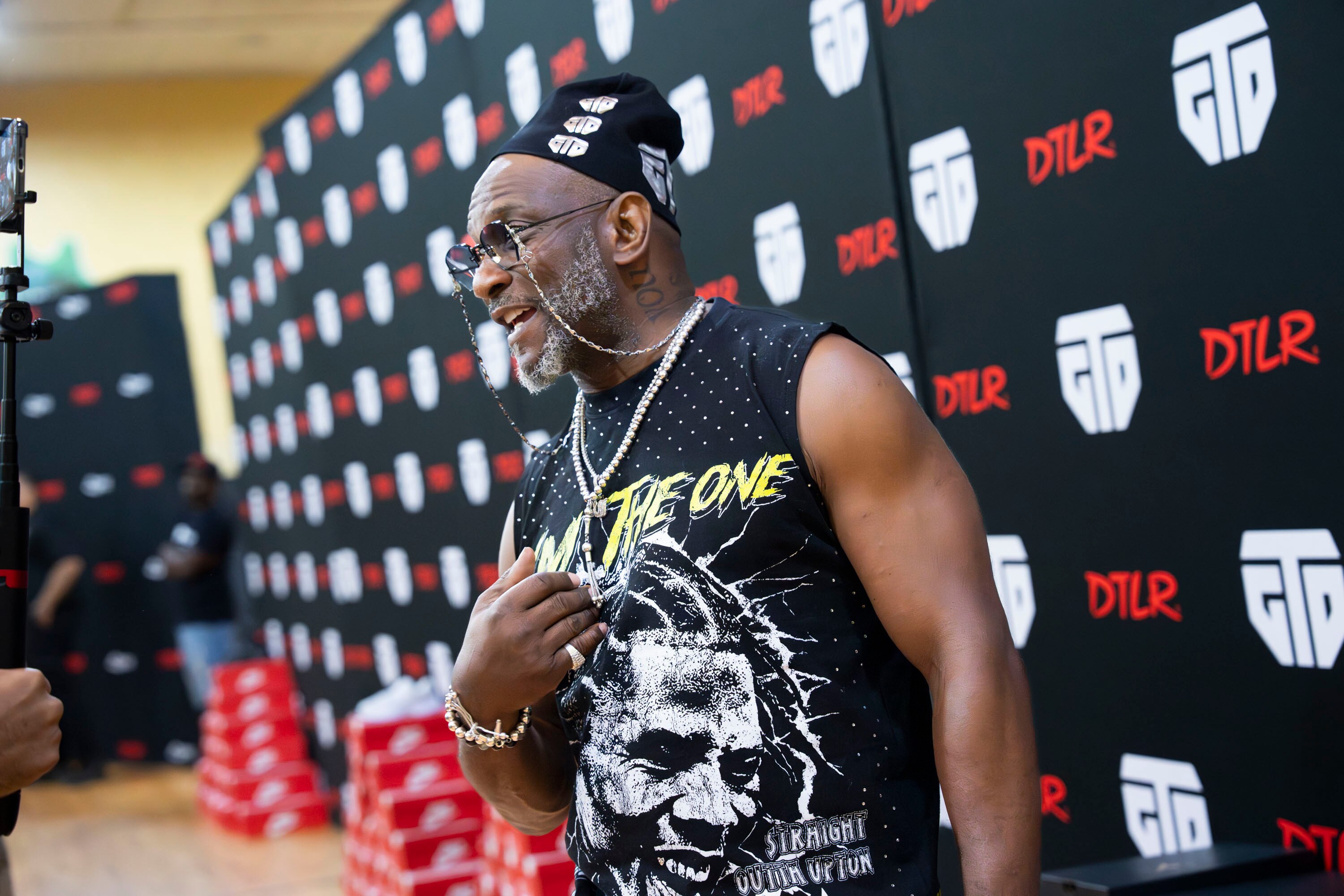 Professional boxer Gervonta “Tank” Davis’ primary coach, Calvin Ford, at a shoe giveaway in partnership with DTLR and Davis in West Baltimore.