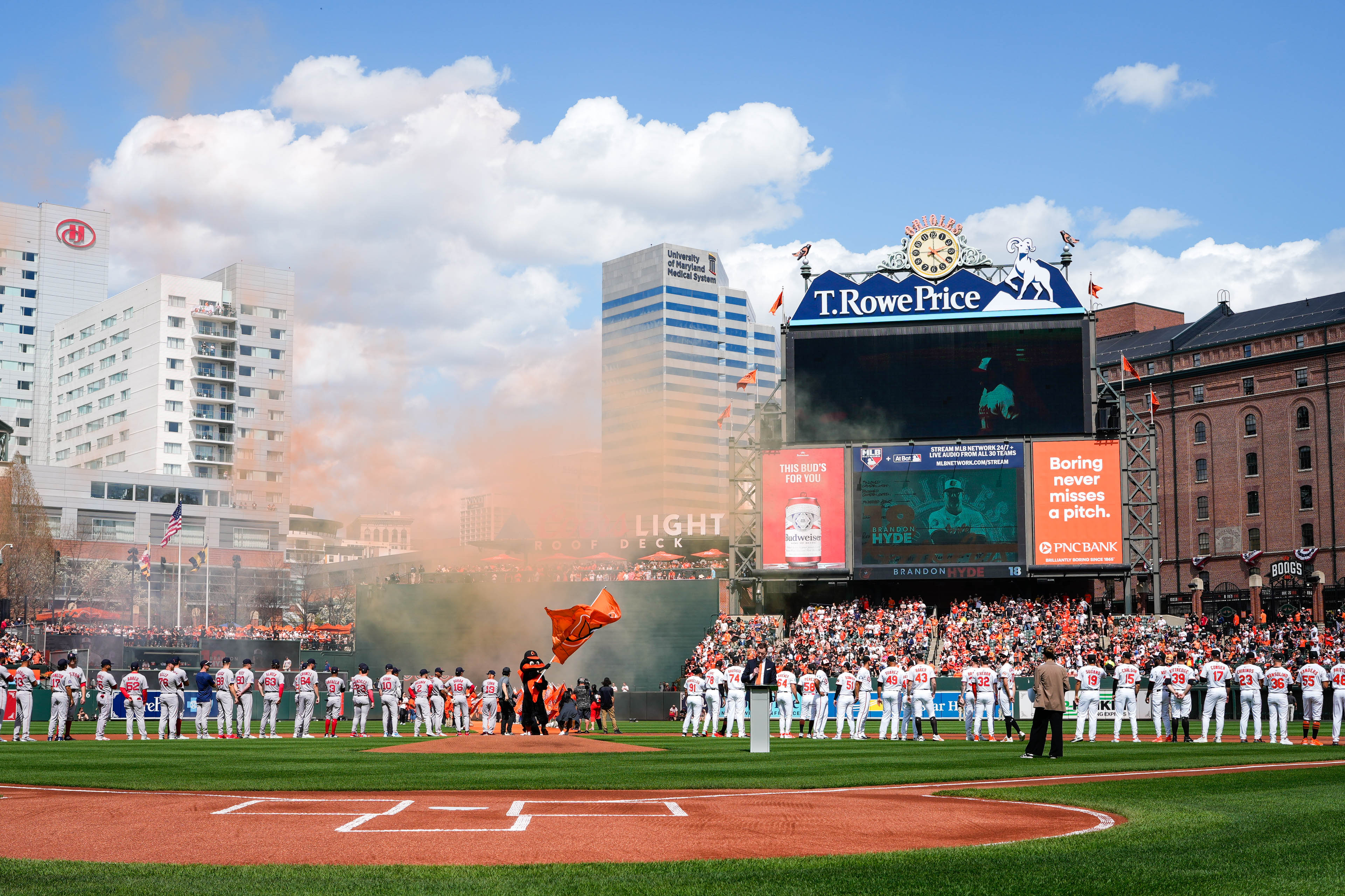 The Baltimore Orioles and Boston Red Sox line up for the national anthem ahead of the Orioles’ home opener on March 31.