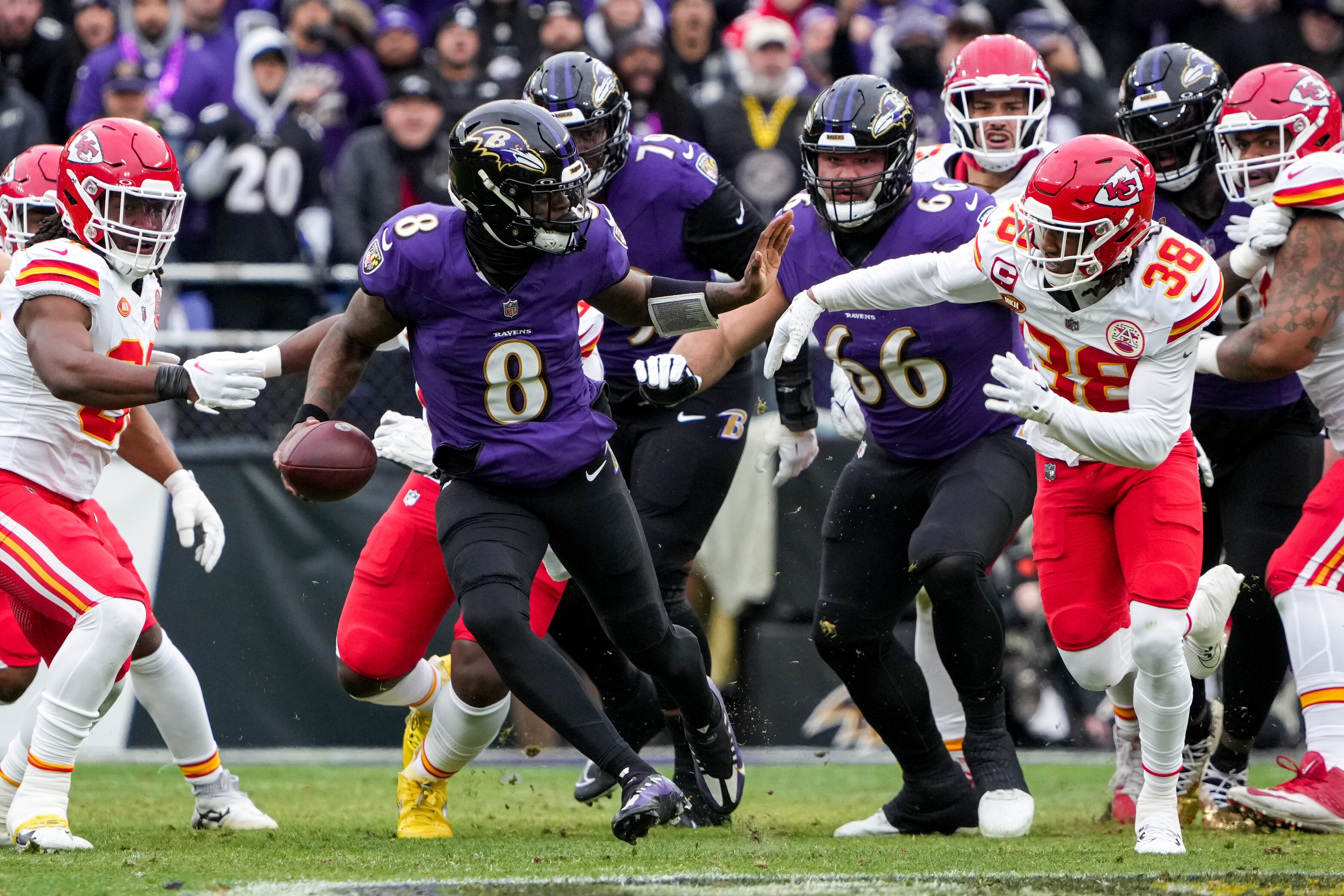Ravens quarterback Lamar Jackson scrambles during the first quarter of the AFC championship game Sunday.