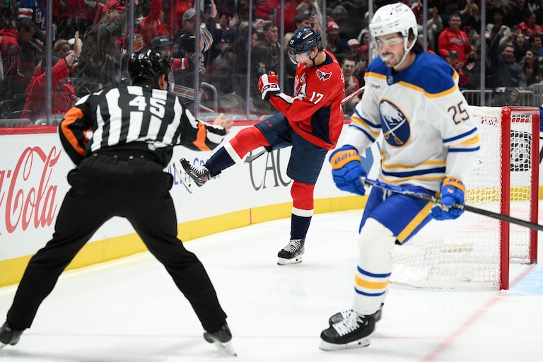 Washington Capitals center Dylan Strome (17) celebrates after his goal near Buffalo Sabres defenseman Owen Power (25) during the second period of an NHL hockey game, Saturday, Oct. 24, 2026, in Washington. (AP Photo/Nick Wass)