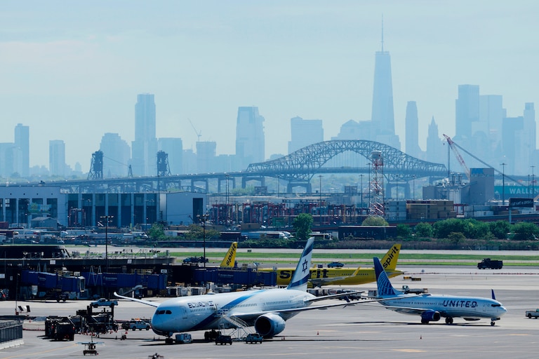 The New York City skyline is seen behind Newark Liberty International Airport in Newark, N.J., Wednesday, May 7, 2025.