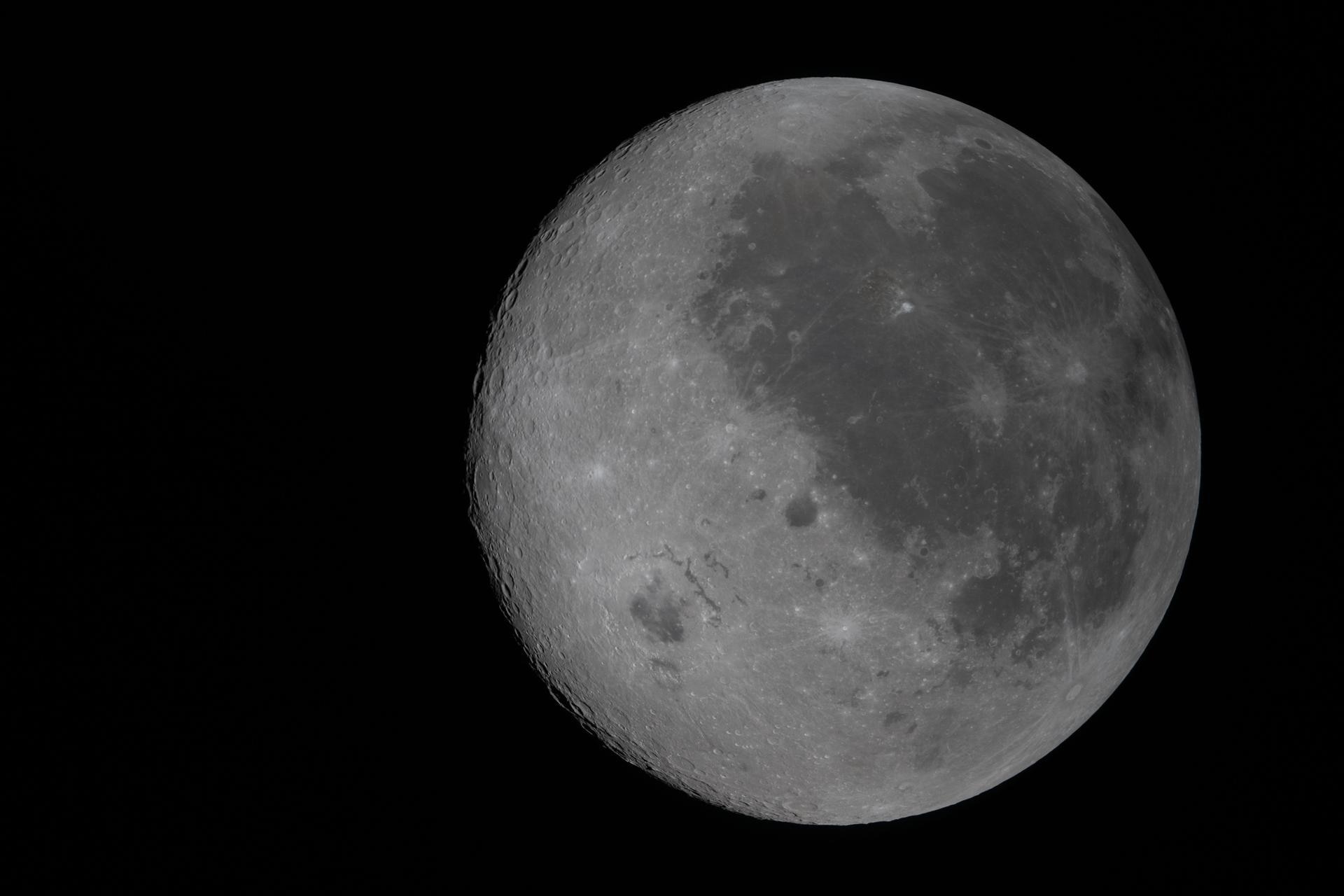 In this fully illuminated view of the Moon, the near side (the hemisphere we see from Earth), is visible on the right.