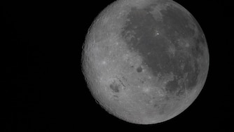 In this fully illuminated view of the Moon, the near side (the hemisphere we see from Earth), is visible on the right.