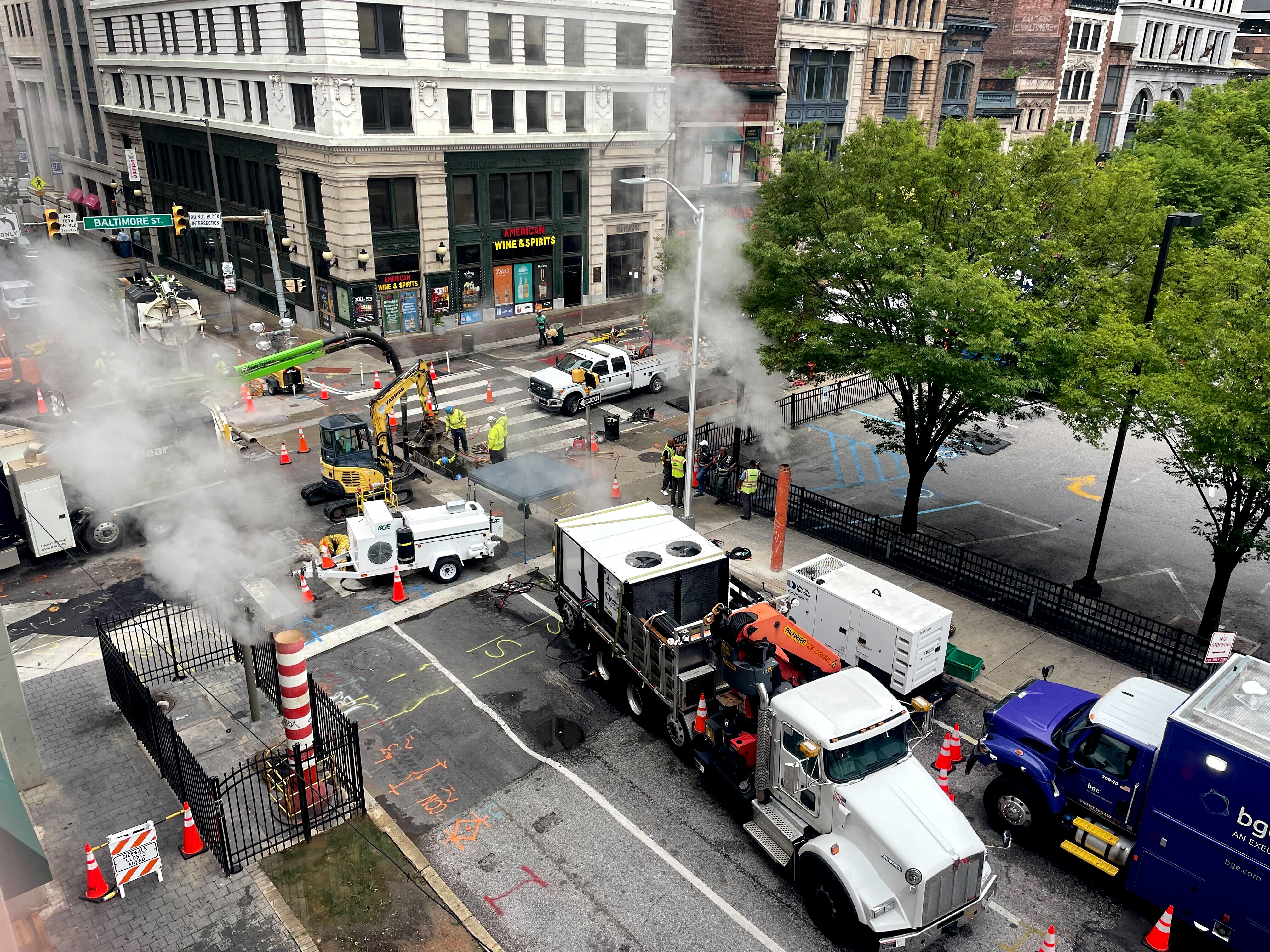 The site of the an underground fire on the morning of July 2, 2025. At this point, South Street was still closed and Baltimore Street was restricted to one lane.