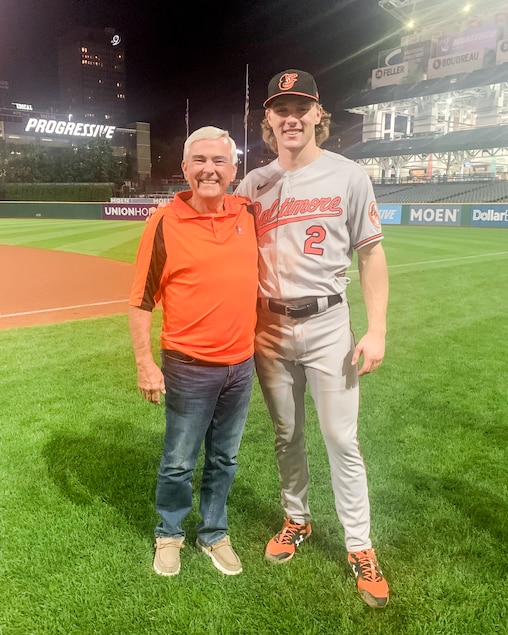 T.J. Etheridge, left, with his grandson Gunnar Henderson at Gunnar's debut game in the major leagues in Cleveland in 2022.