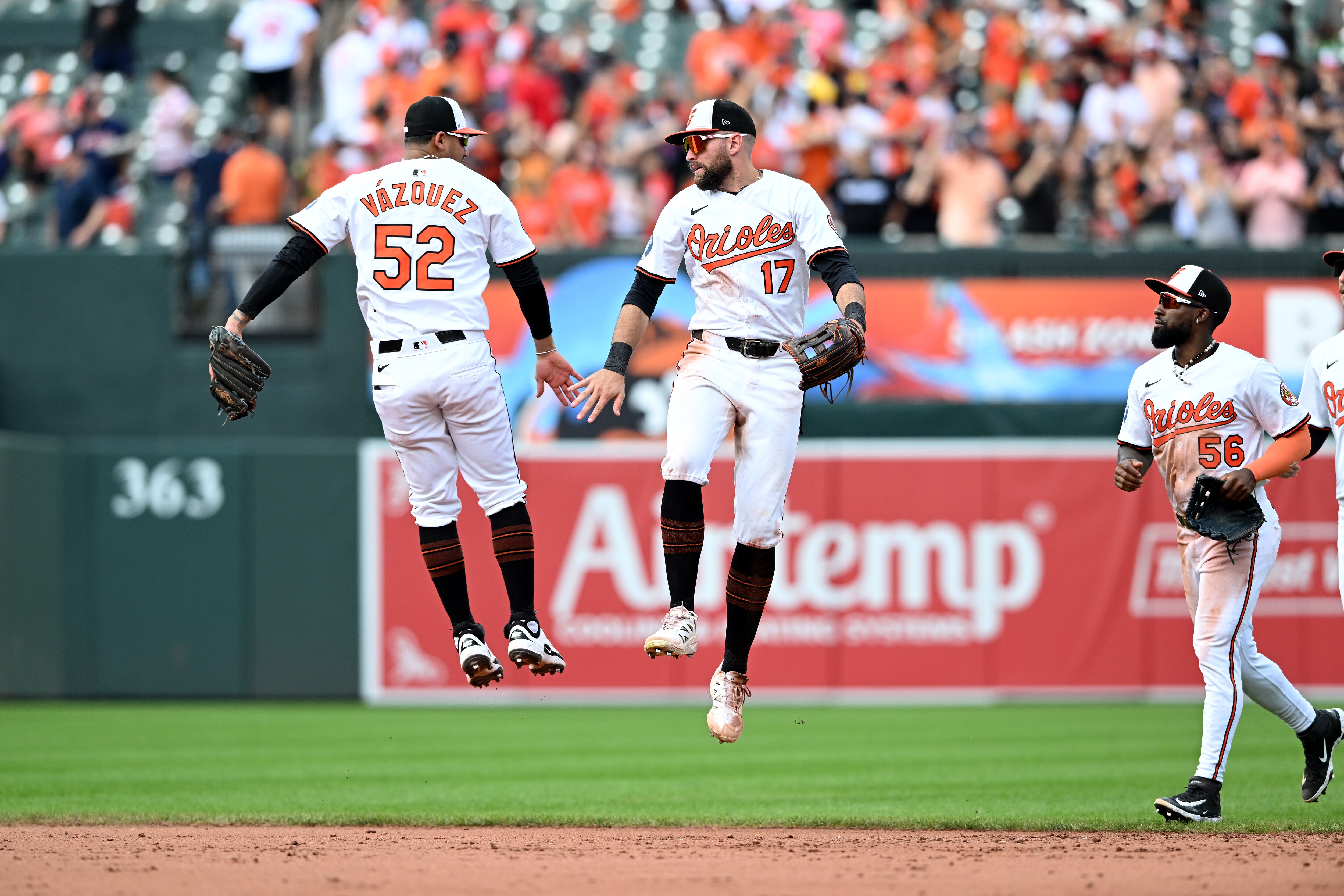 Orioles second baseman Luis Vázquez and outfielder Colton Cowser celebrate after Sunday’s 3-2 win over the Astros at Camden Yards.