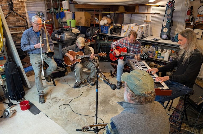 Co-founder Jeff Holland, lower left, is returning to the Eastport Oyster Boys for its performance March 22, 2026 at Maryland Hall. Regular members of the band include, from left, Andy Fegley, co-founder Kevin Brooks, Tom Guay and Mike Lange.