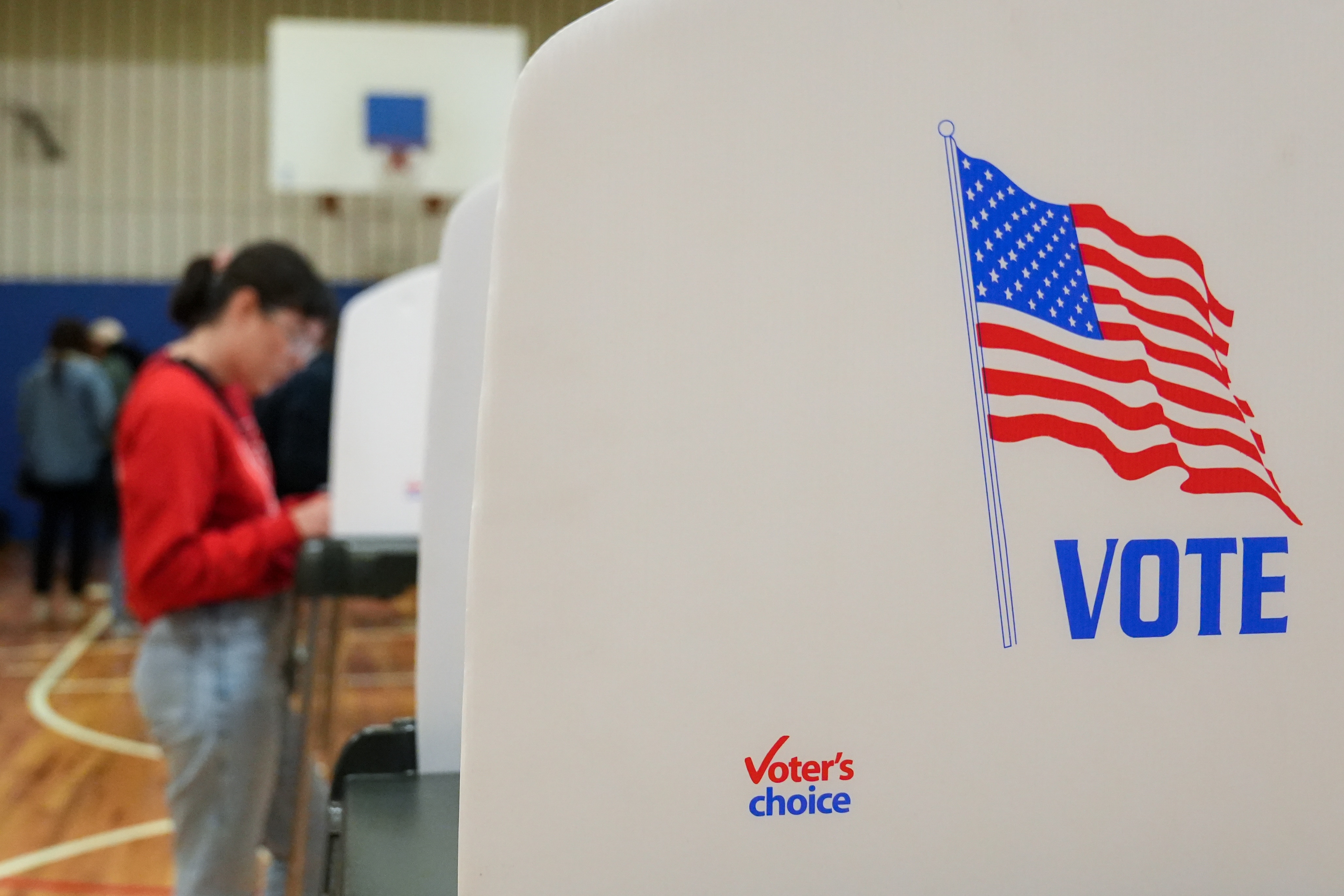 A Baltimore resident casts their vote on Election Day, Nov. 8, 2022, at Margaret Brent Elementary/Middle School. Polling locations for the general election remain open until 8 p.m.