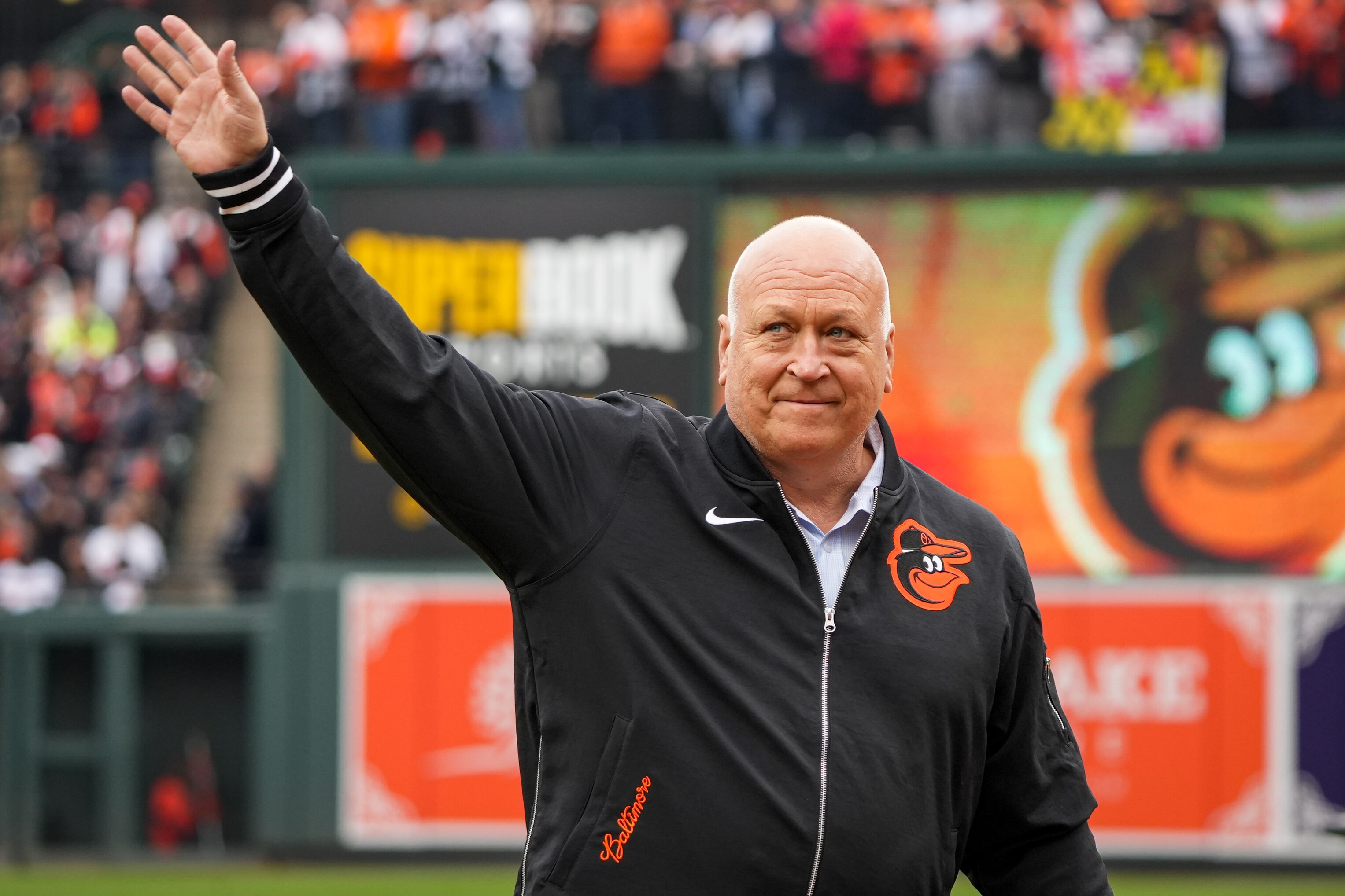Baltimore Orioles legend and Hall of Famer Cal Ripken Jr. waves to the crowd at Camden Yards on Thursday, March 28, 2024.
