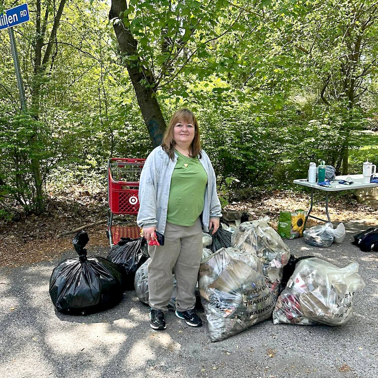 Kimberley Stansbury joins the Fellowship Forest Community Association, community members, and volunteers from Towson University for a stream clean-up event in April.