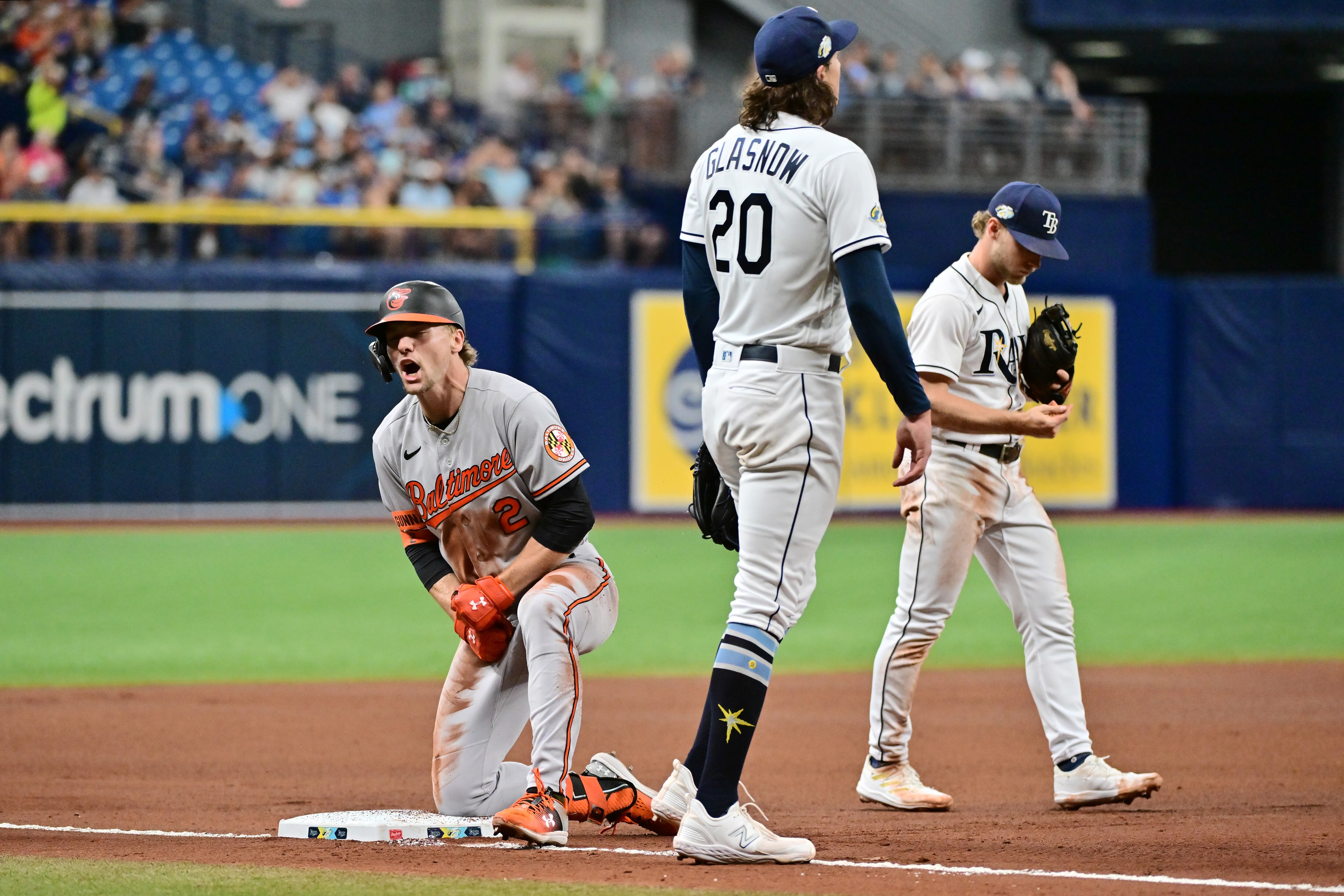 The Orioles' Gunnar Henderson reaches third base on a double and a throwing error during the fourth inning of Baltimore's 4-3, 10-inning victory at Tampa Bay on Thursday night.