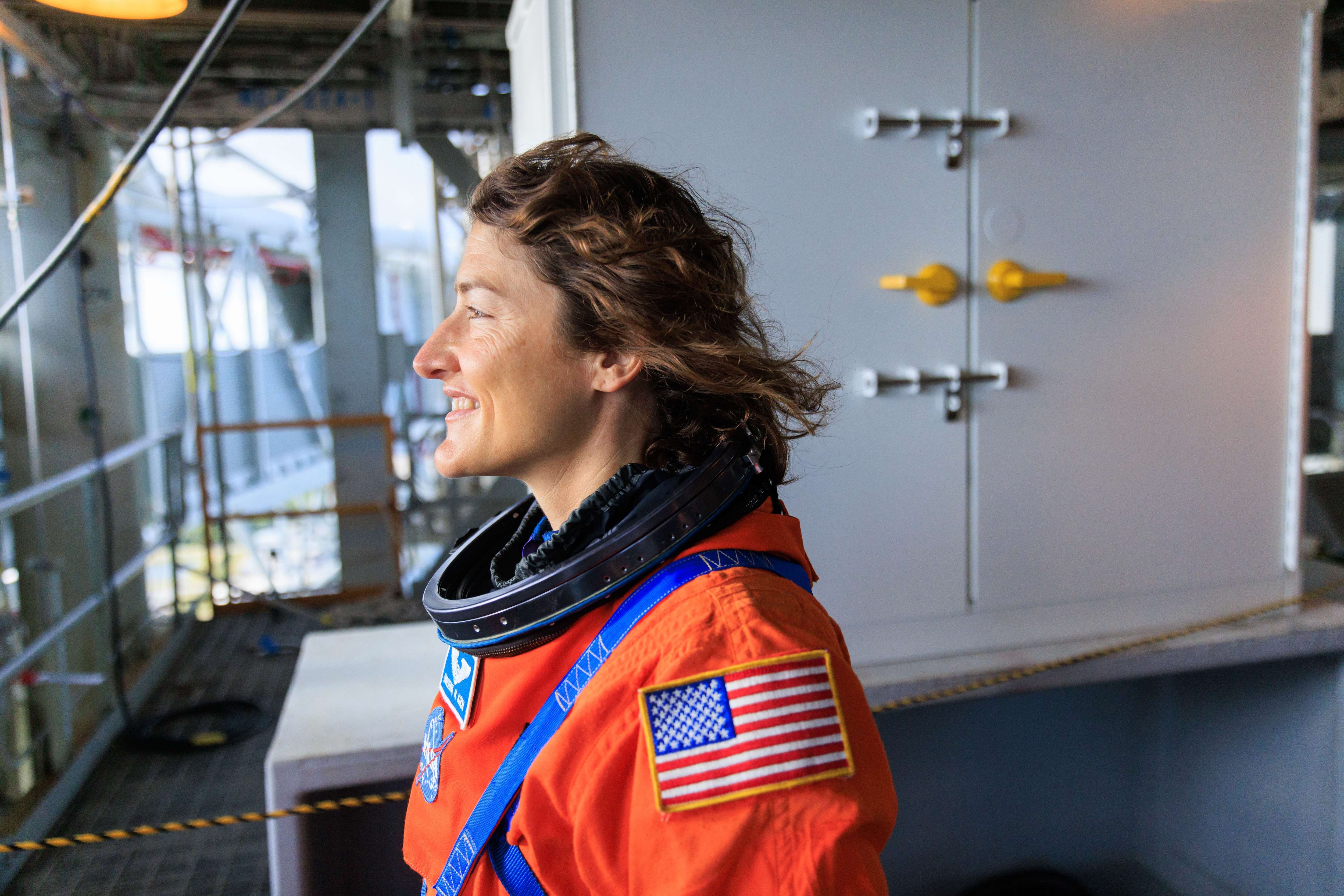 Artemis II NASA astronaut Christina Koch stands on the mobile launcher at Launch Pad 39B as part of an integrated ground systems test at Kennedy Space Center in Florida on Wednesday, Sept. 20, 2023, to test the crew timeline for launch day.