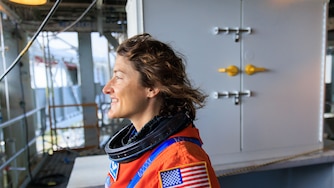 Artemis II NASA astronaut Christina Koch stands on the mobile launcher at Launch Pad 39B as part of an integrated ground systems test at Kennedy Space Center in Florida on Wednesday, Sept. 20, 2023, to test the crew timeline for launch day.