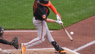 Baltimore Orioles' Pete Alonso doubles off Pittsburgh Pirates pitcher Braxton Ashcraft, driving in a run, during the fourth inning of a baseball game in Pittsburgh, Sunday, April 5, 2026.