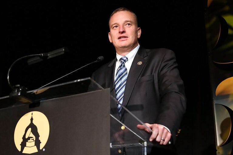WASHINGTON, DC - APRIL 13: Honoree Rep. Tom Rooney (R-Fla) speaks at the GRAMMYs on The Hill Dinner at The Hamilton on April 13, 2016 in Washington, DC.