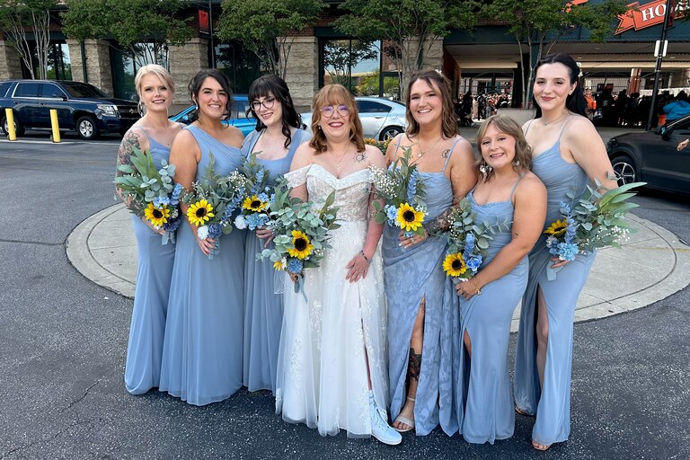 Sierra Rubin of Glen Burnie, posed with her bridesmaids in front of Camden Yards for her bridal party photos.