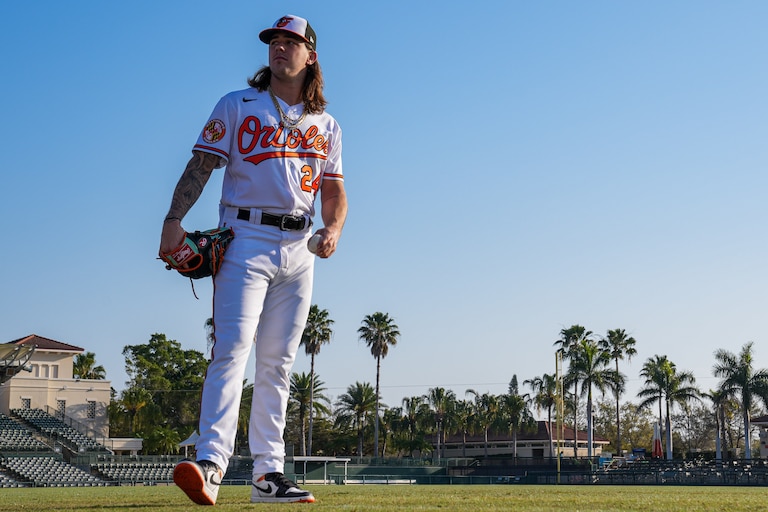 DL Hall (24) walks around the main field as he waits for other teammates to arrive on Photo Day at Ed Smith Stadium in Sarasota on 2/23/23. The Baltimore Orioles’ Spring Training session runs from mid-February through the end of March.