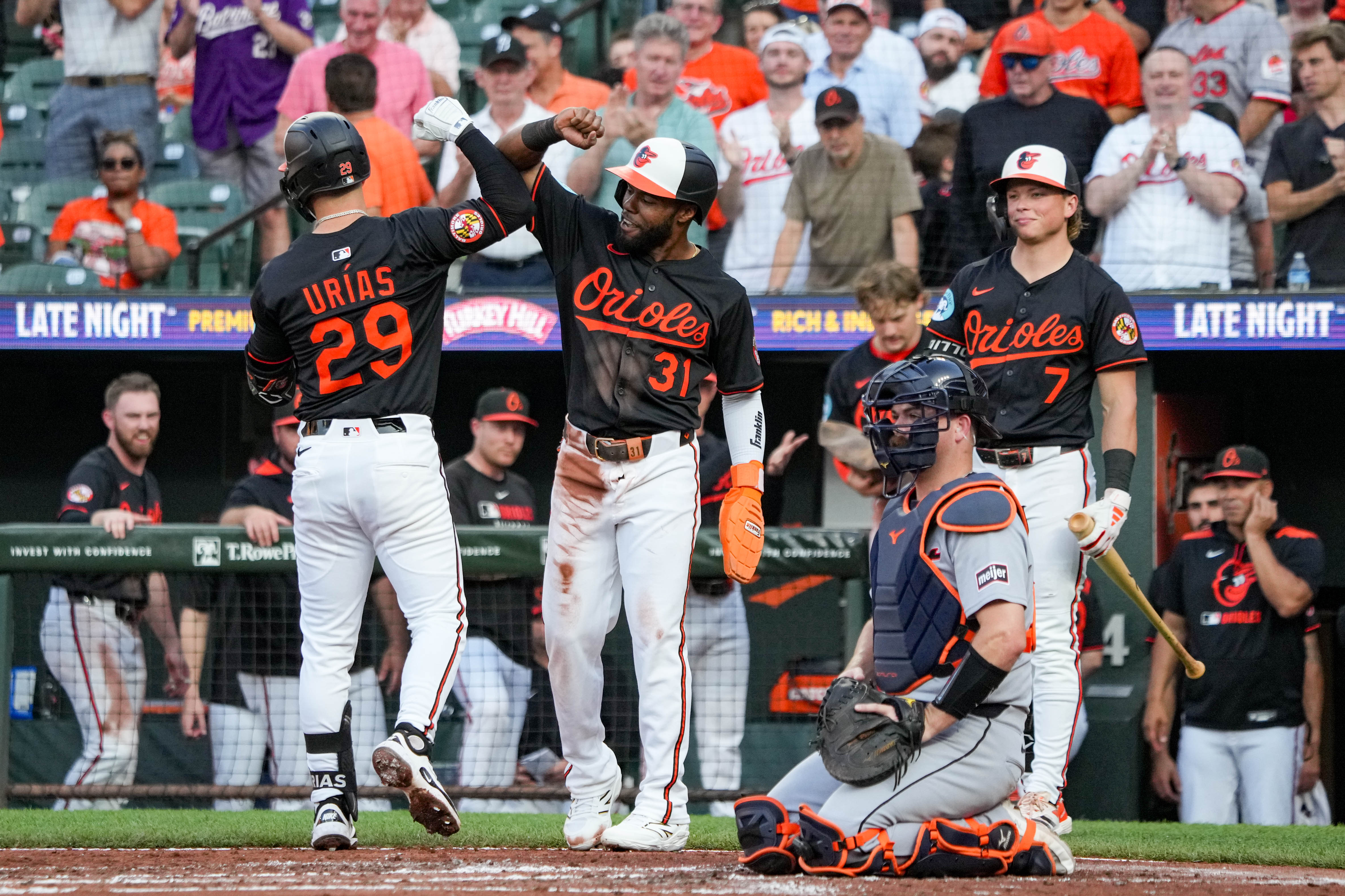 Orioles third baseman Ramón Urías bumps forearms with outfielder Cedric Mullins after hitting a two-run homer in the third inning Wednesday night at Camden Yards.