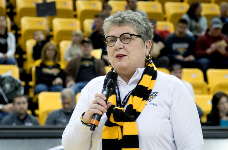 Kim Schatzel, then-president at Towson University, speaks to the crowd after signing a memorandum of understanding between the Maryland National Guard and Towson University during the pre-game ceremony at Towson University’s military appreciation men’s basketball game at Towson, Maryland, Jan. 27, 2018. The memorandum affirms the partnership between the Maryland National Guard and Towson University. It also provides new opportunities to both Maryland National Guard service members and Towson University students in areas like cyber security.